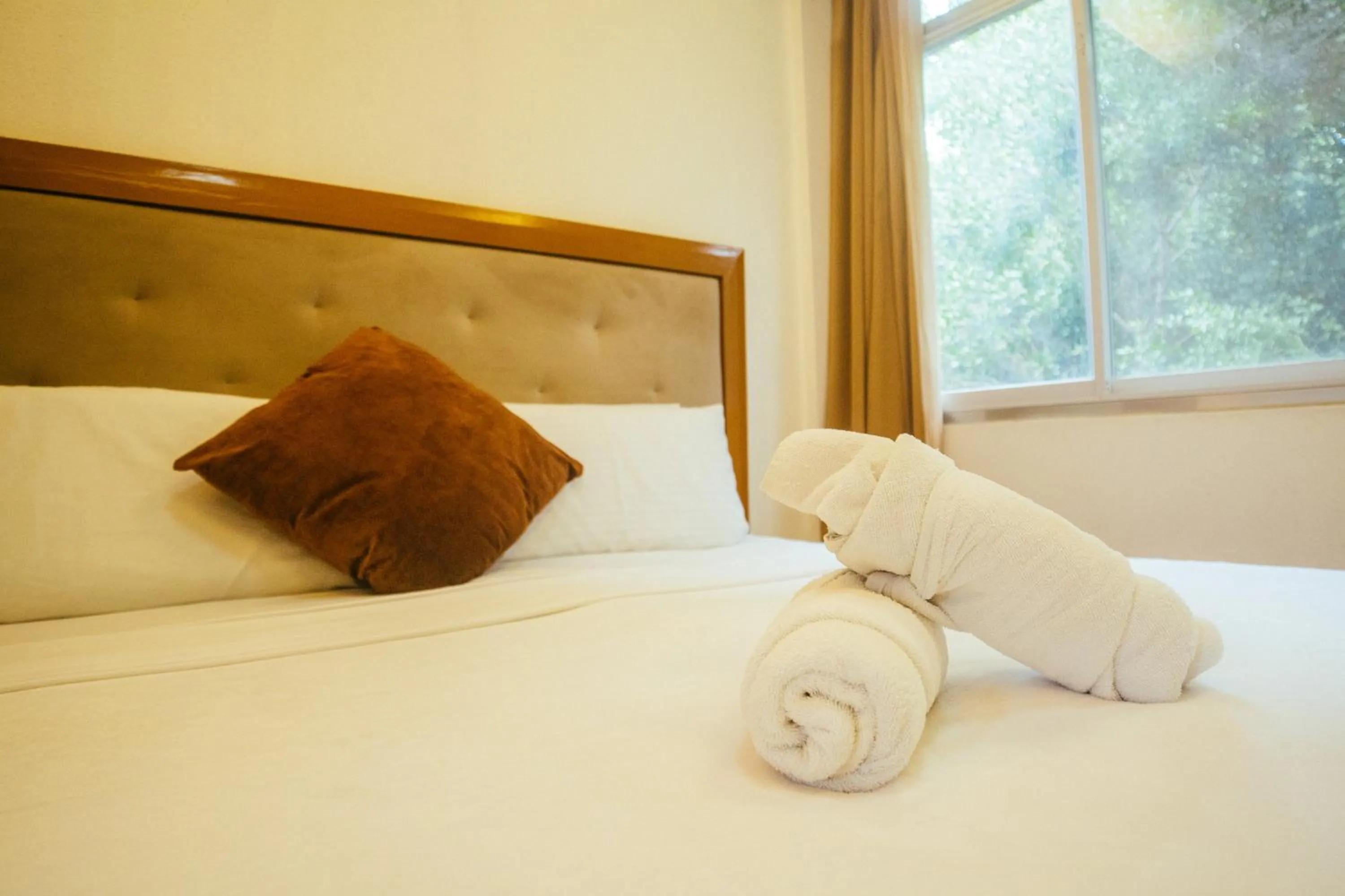 Bed in Marina Palawan Boutique Nature Resort