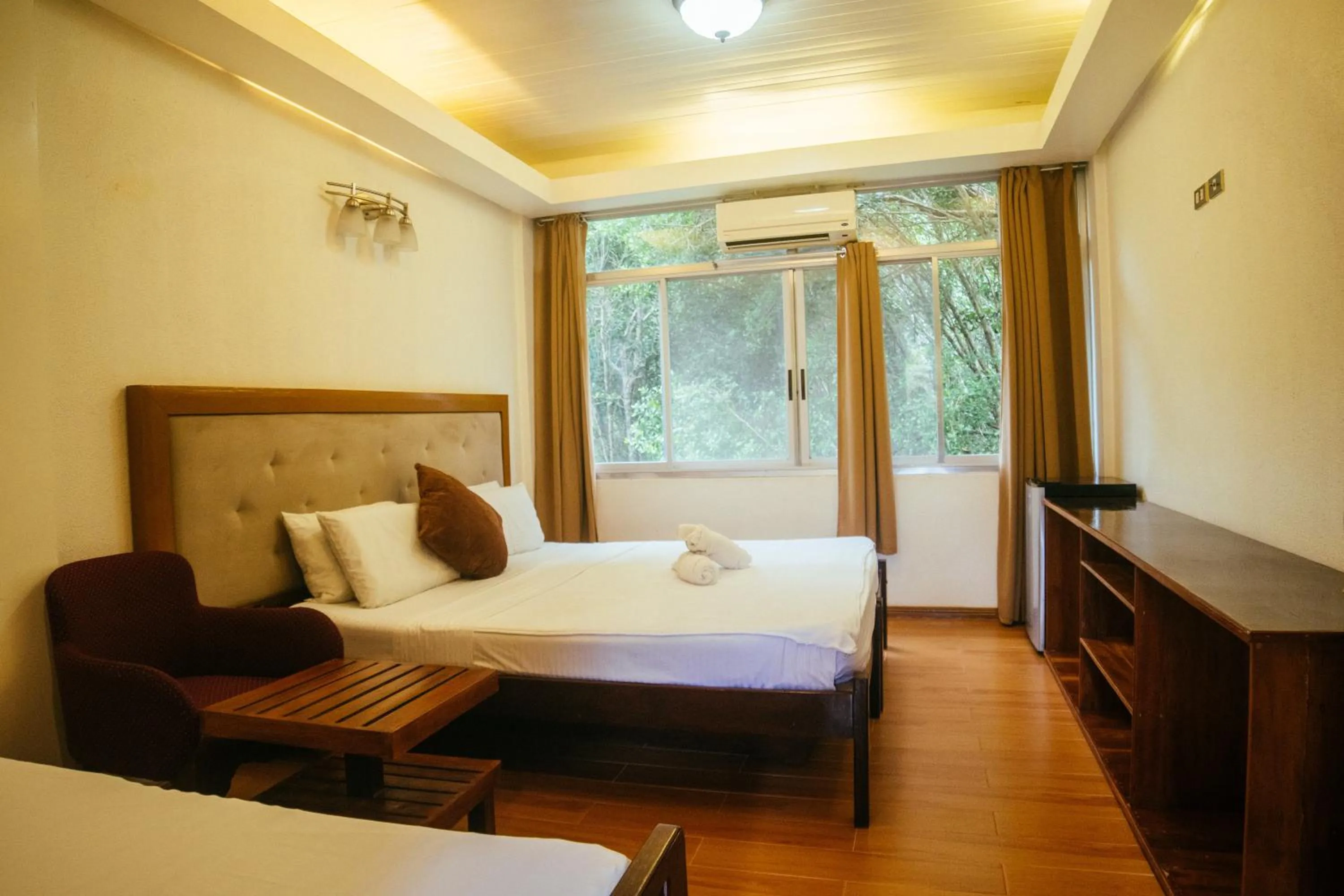 Bed in Marina Palawan Boutique Nature Resort