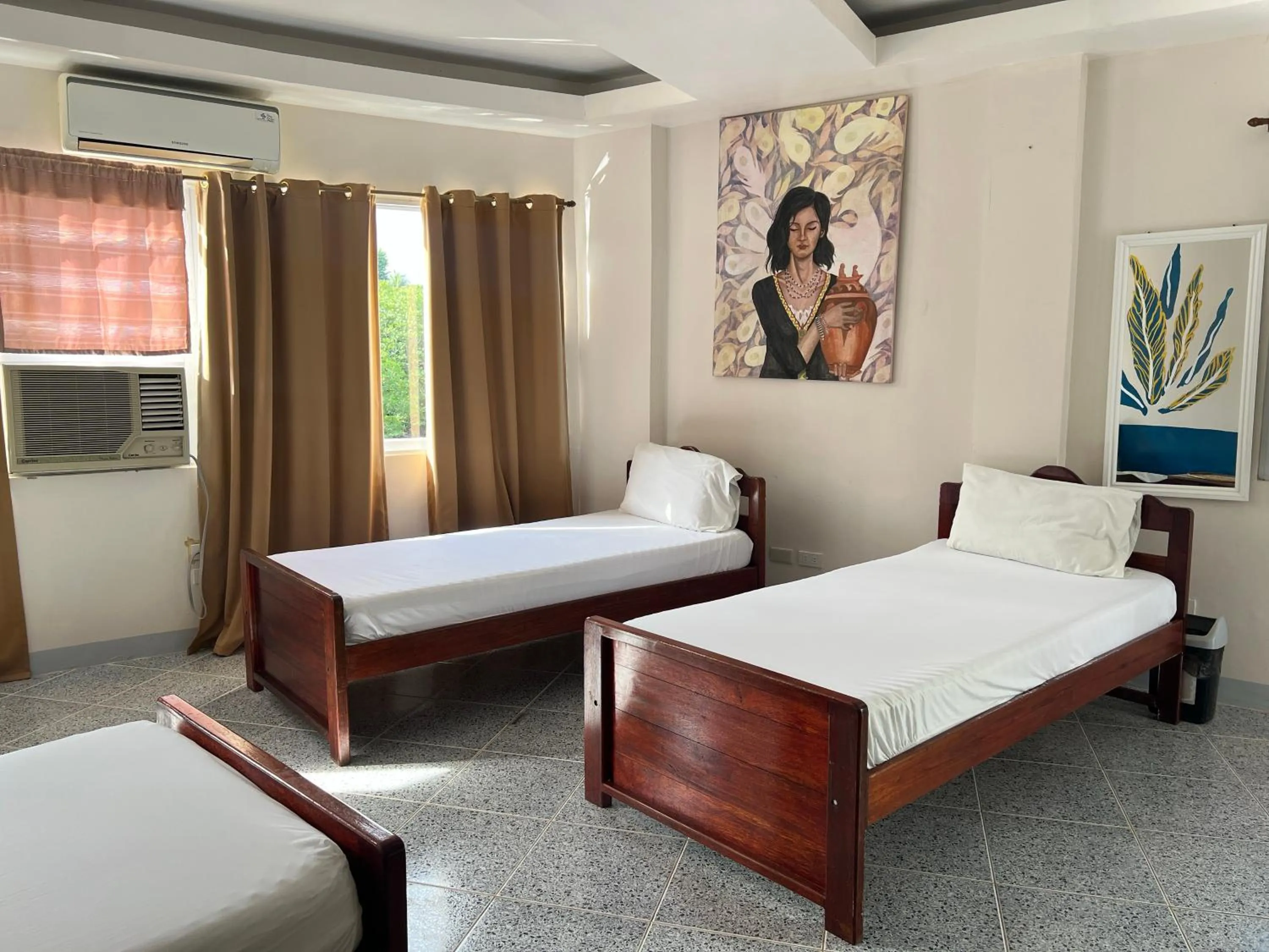 Bed in Marina Palawan Boutique Nature Resort