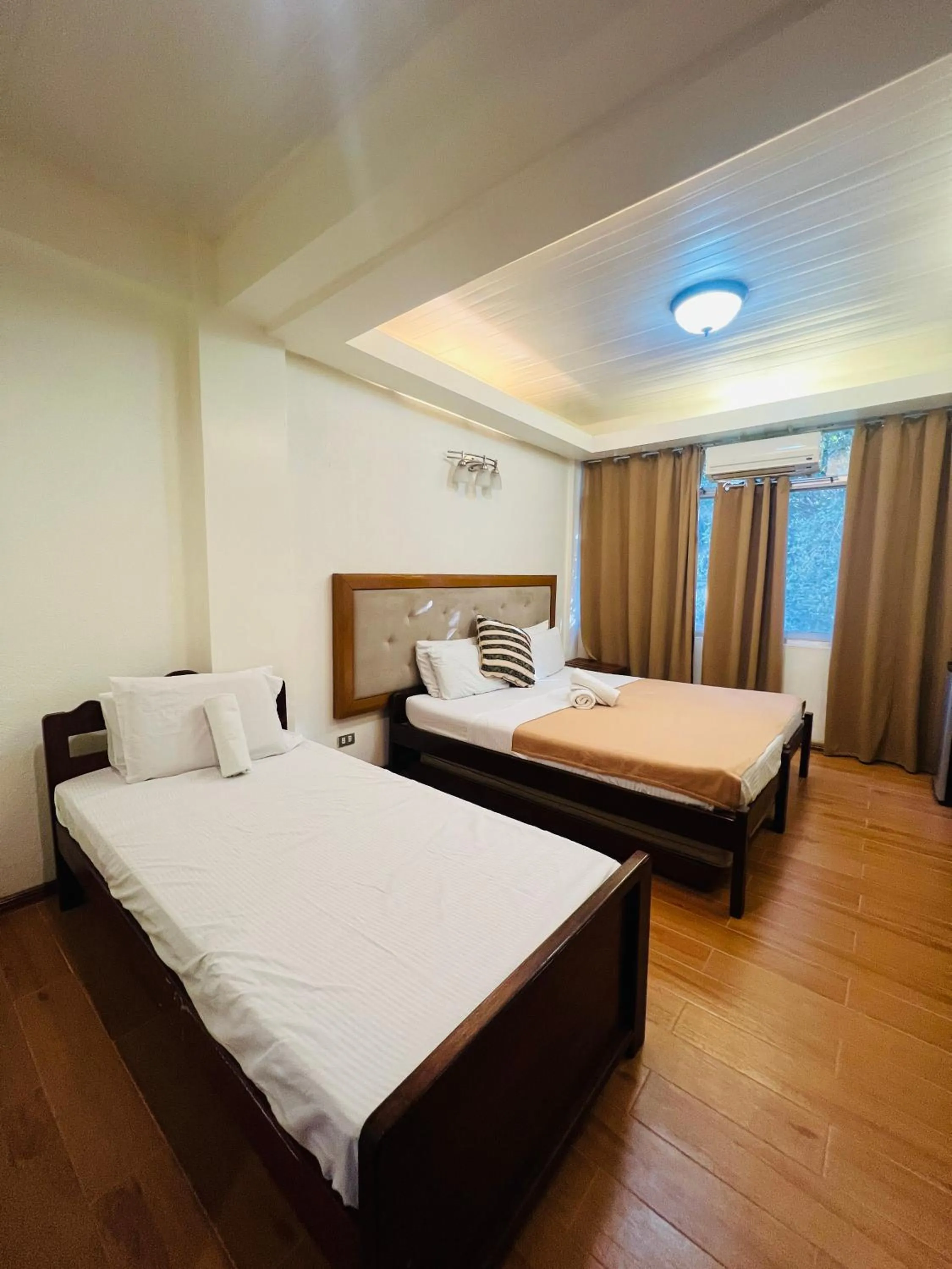 Bed in Marina Palawan Boutique Nature Resort