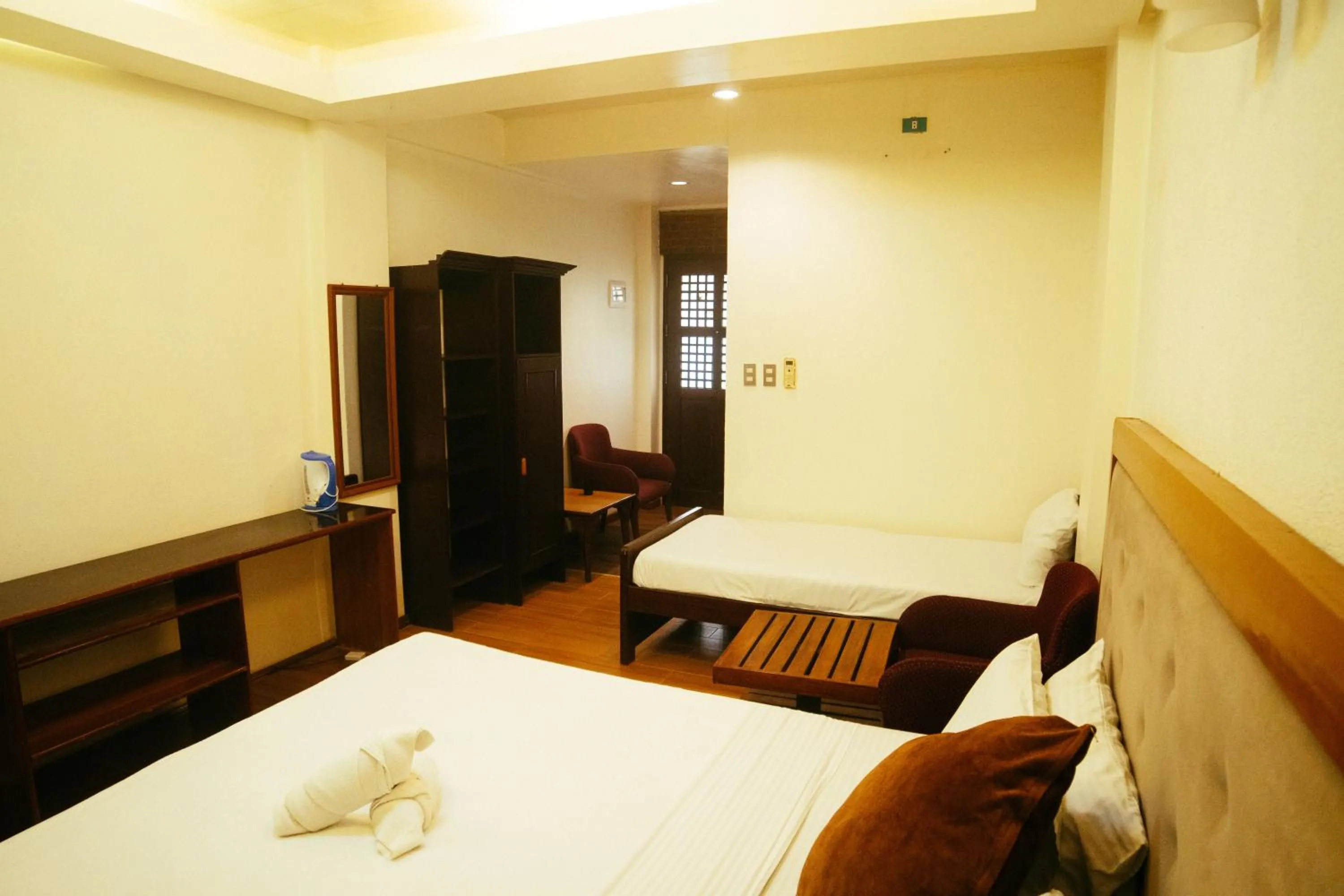 Bed in Marina Palawan Boutique Nature Resort