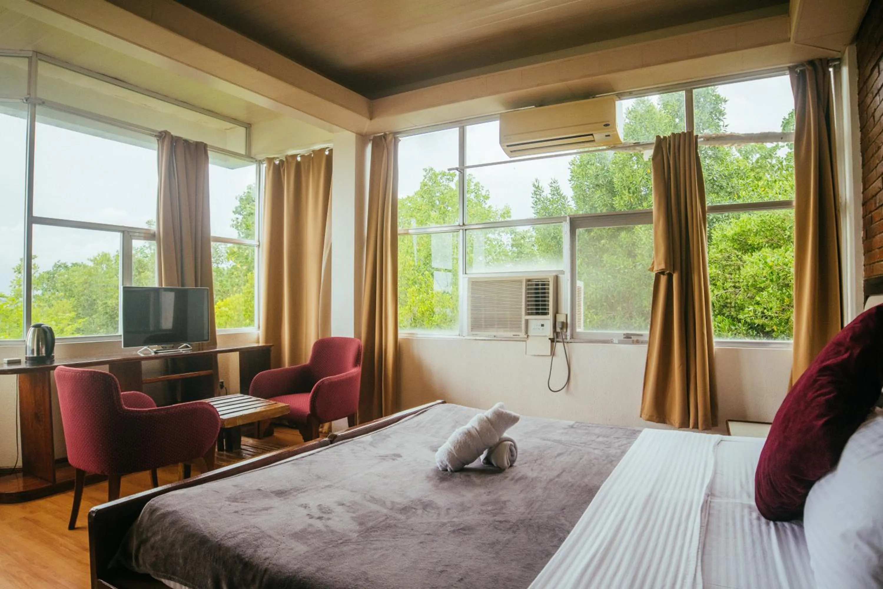 Bed in Marina Palawan Boutique Nature Resort