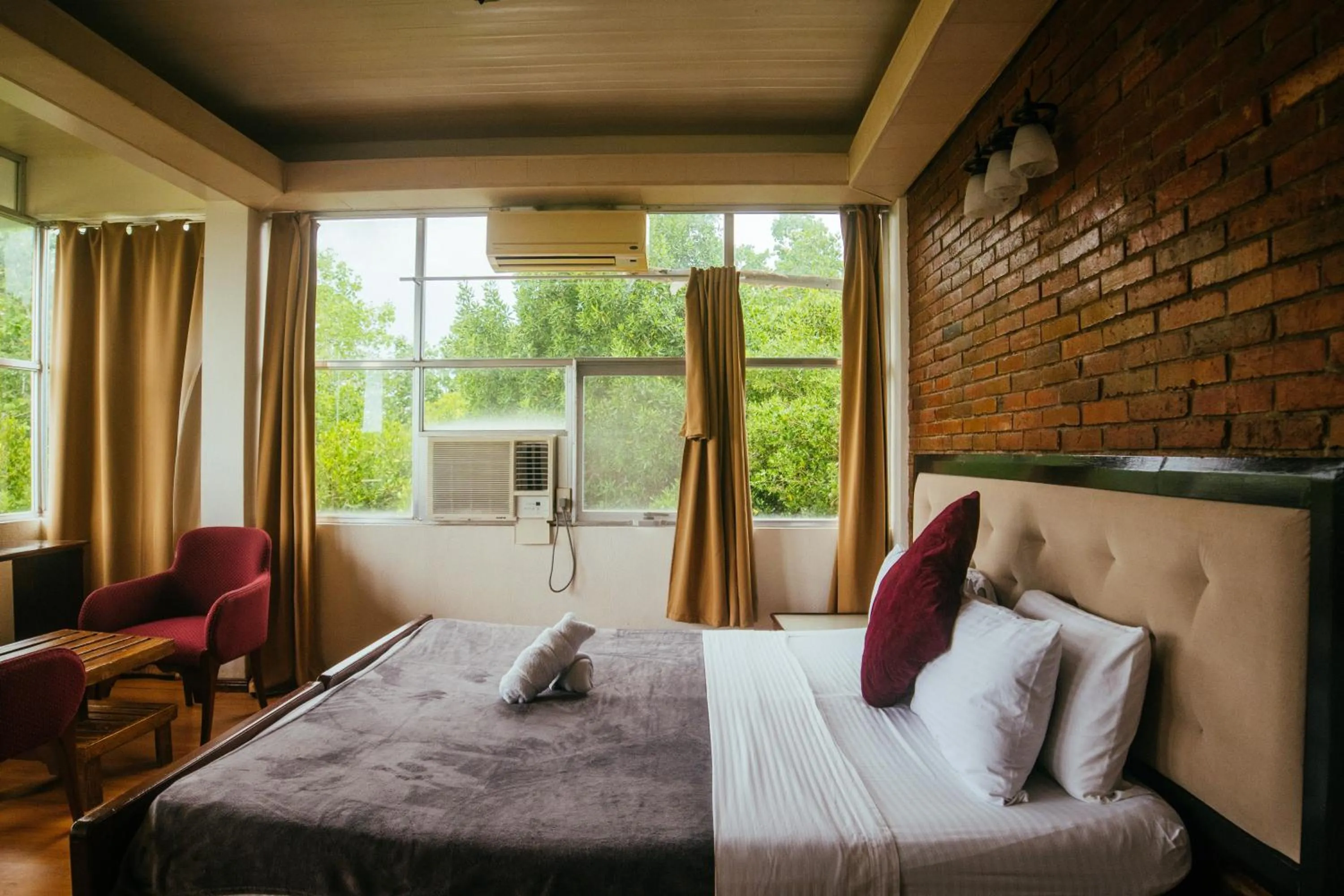 Bed in Marina Palawan Boutique Nature Resort