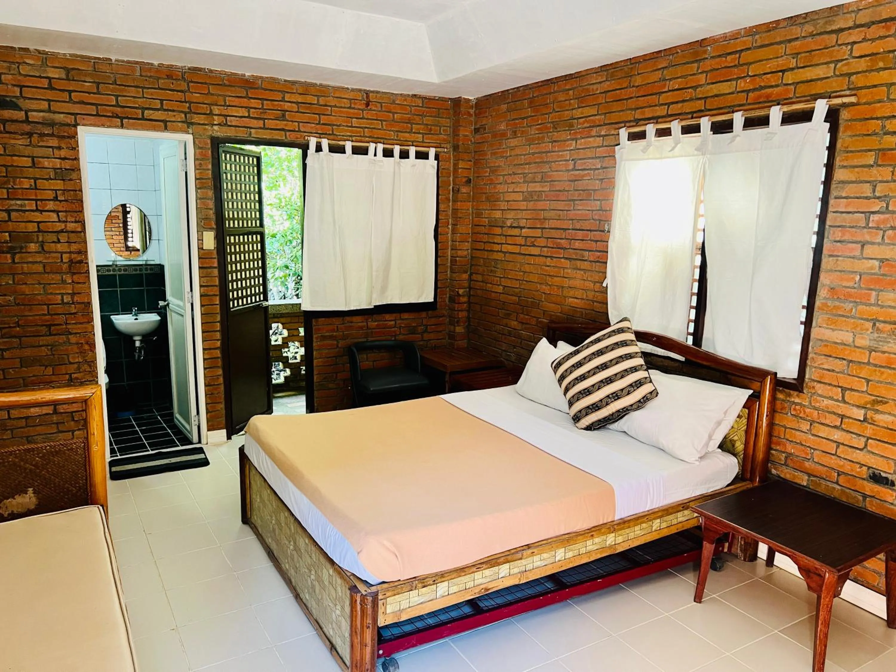Photo of the whole room, Bed in Marina Palawan Boutique Nature Resort