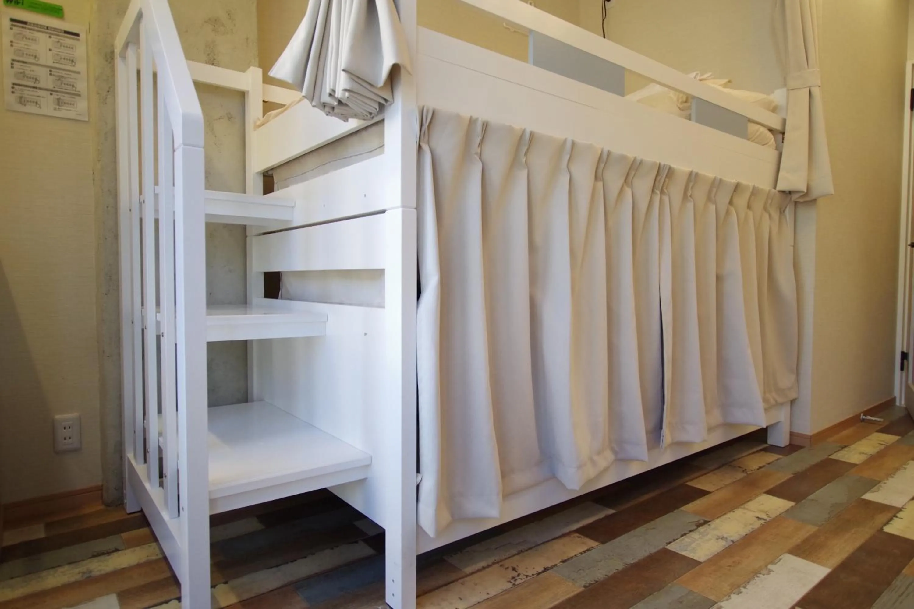 Bed in Cinnamon Guesthouse Dogo