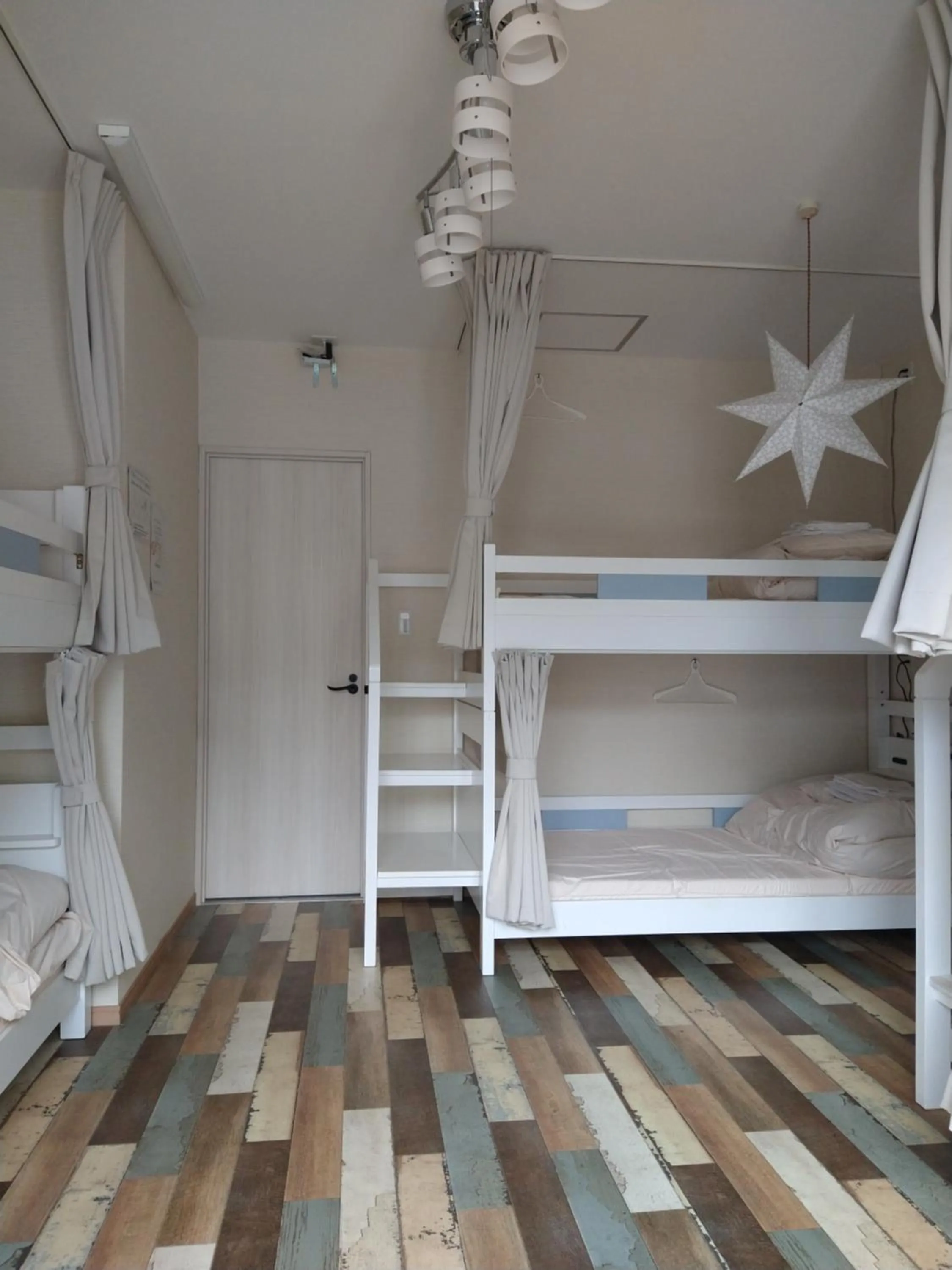 Bed in Cinnamon Guesthouse Dogo