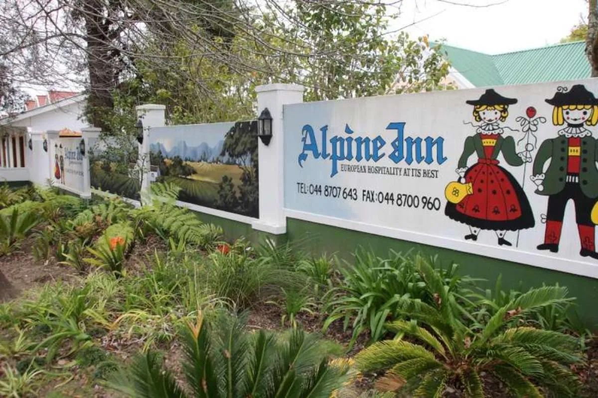 Property logo or sign in Alpine Inn