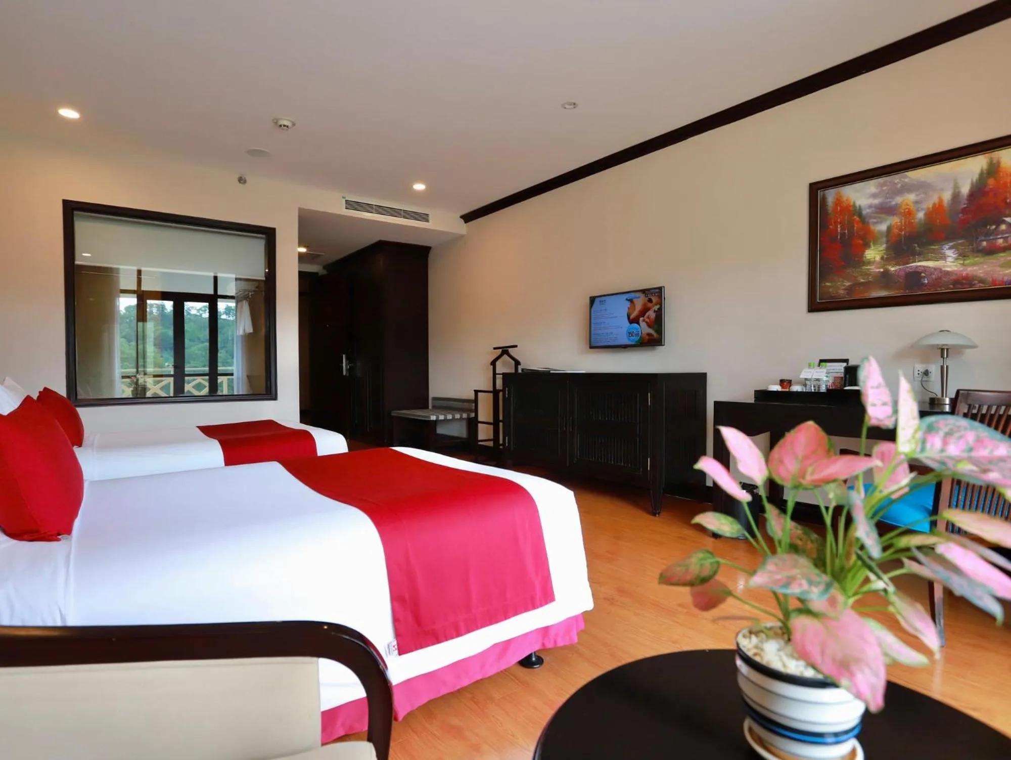 Bed in Swiss-Belresort Tuyen Lam