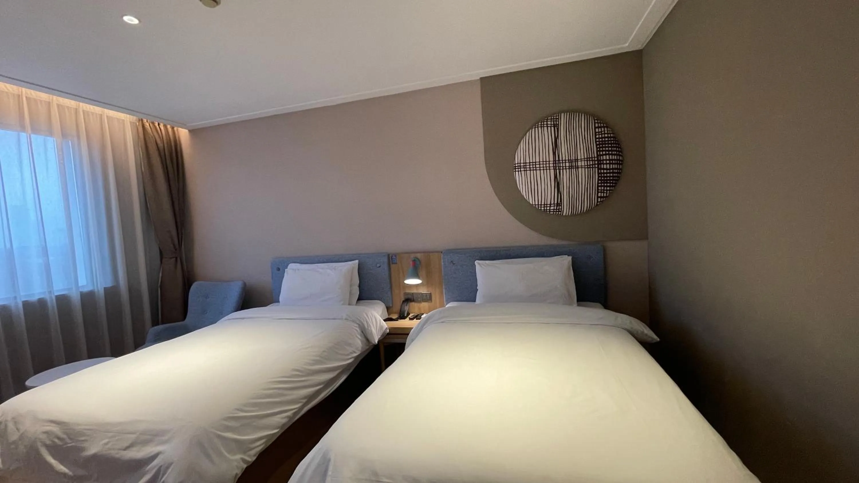 Bed in Home Inn Nanjing Railway Station Xiaoshi Metro Station