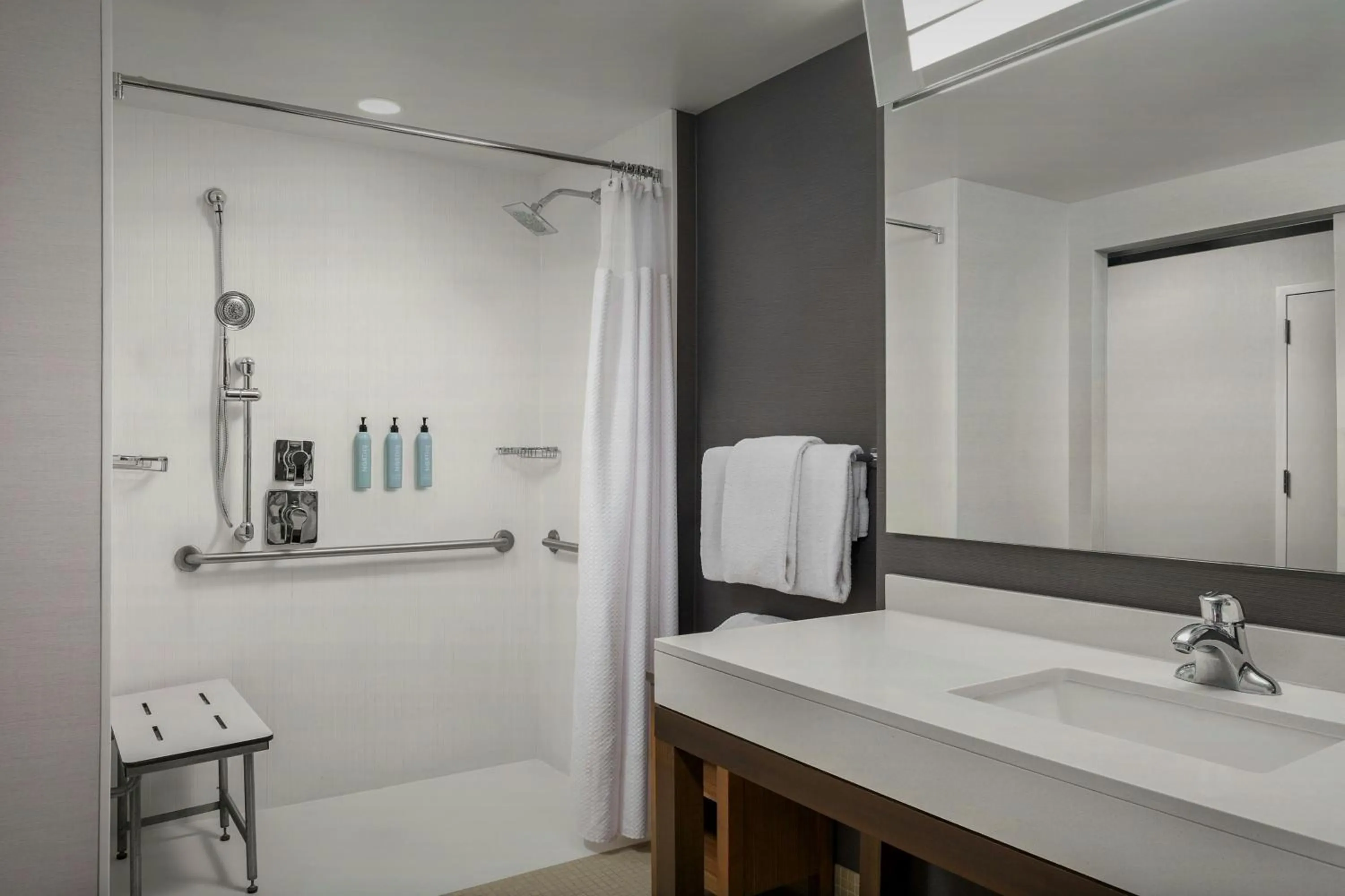 Bathroom in Courtyard by Marriott Muncie at Horizon Convention Center