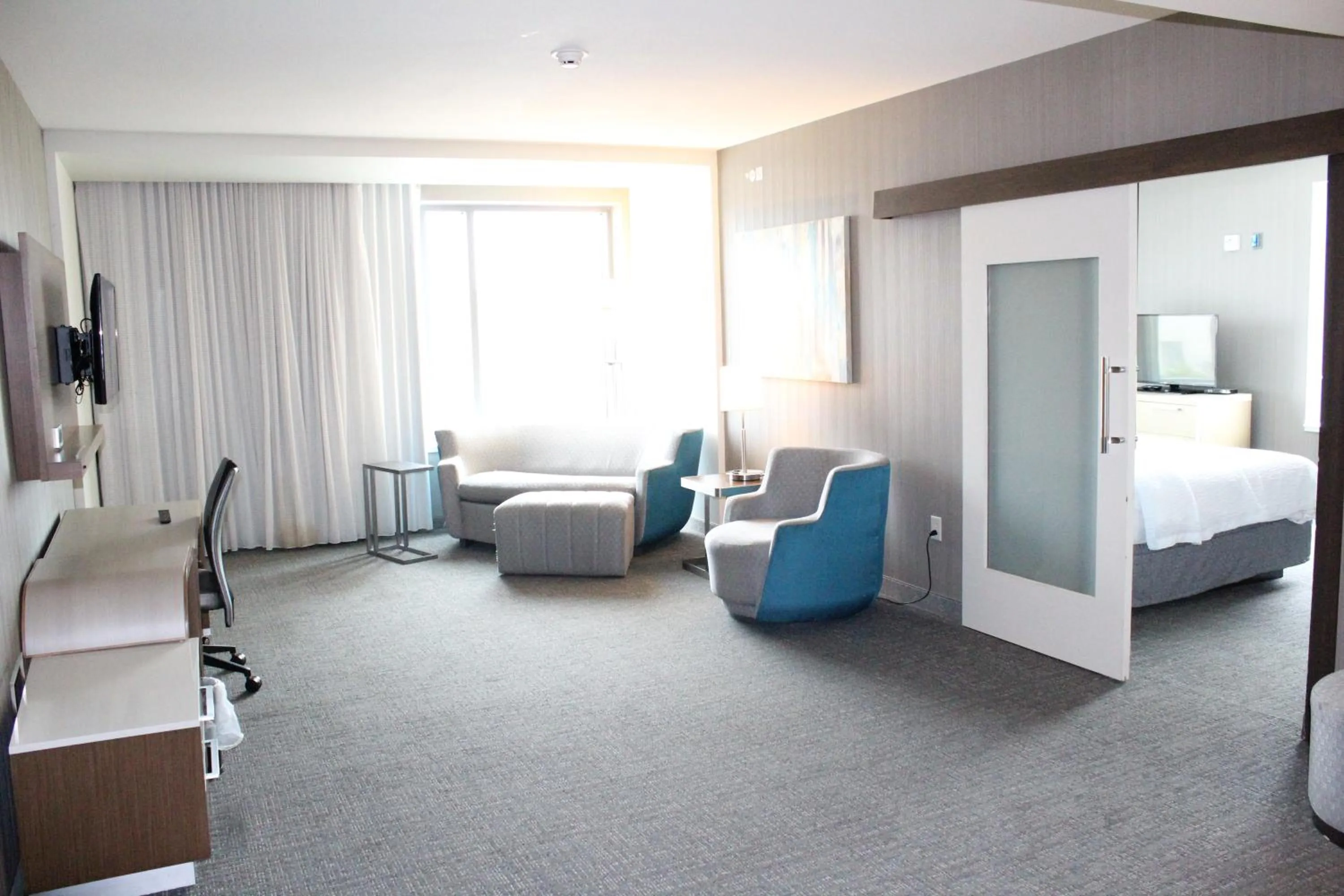 Living room, Bed in Courtyard by Marriott Muncie at Horizon Convention Center
