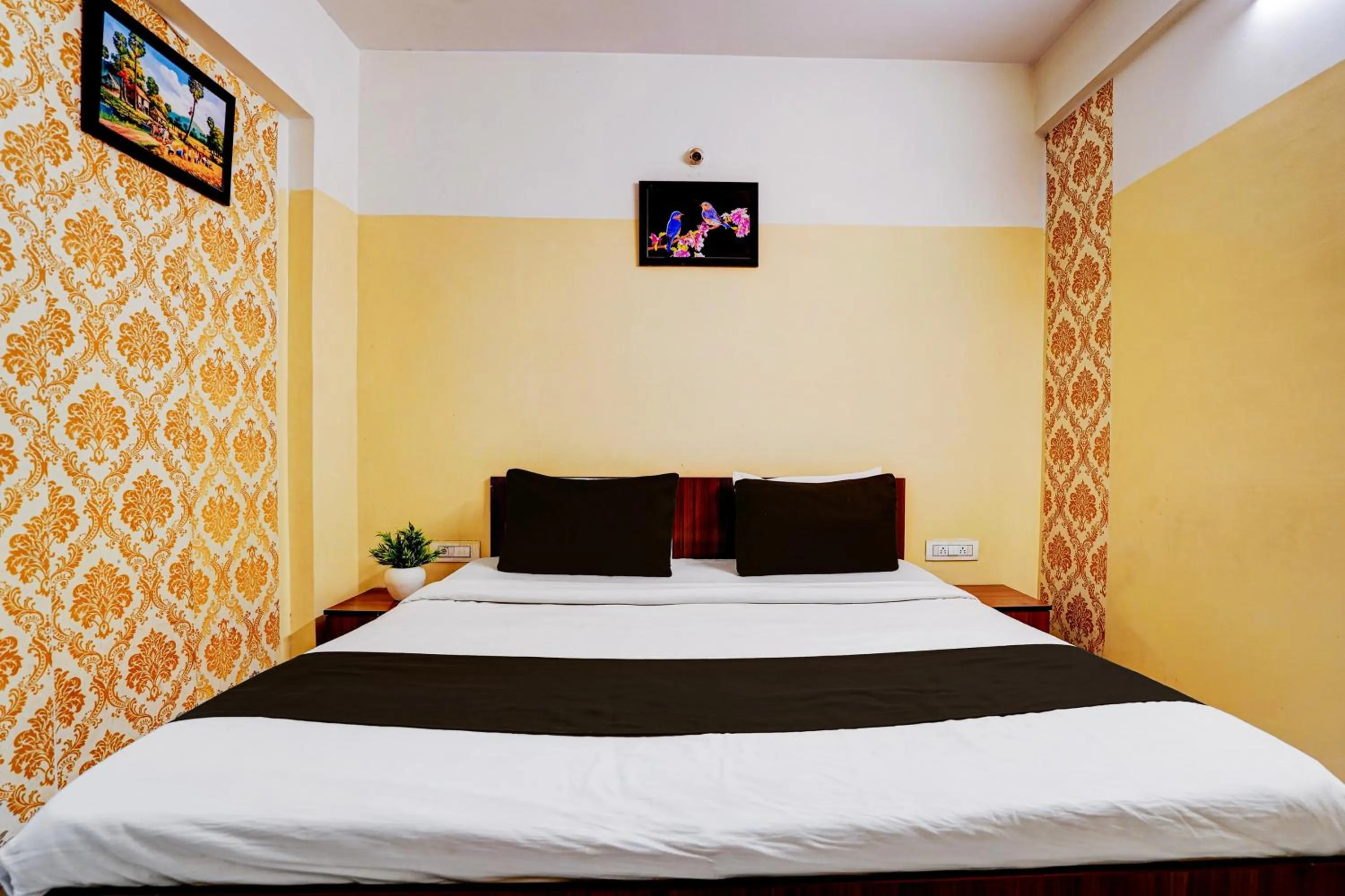 Bedroom, Bed in Hotel O Nesara Inn