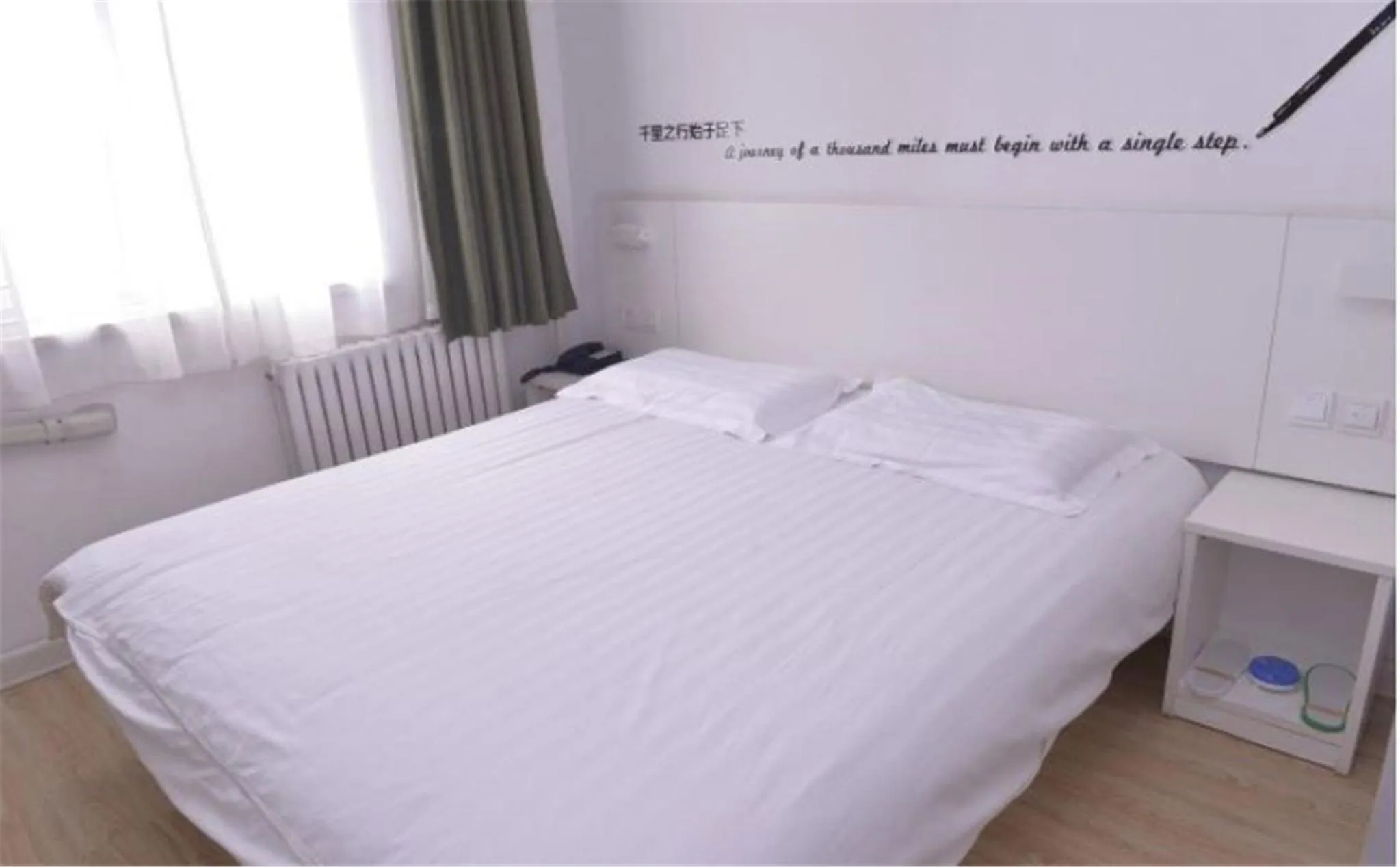 Bed in Motel Ji'nan Shandong University Shanda Road