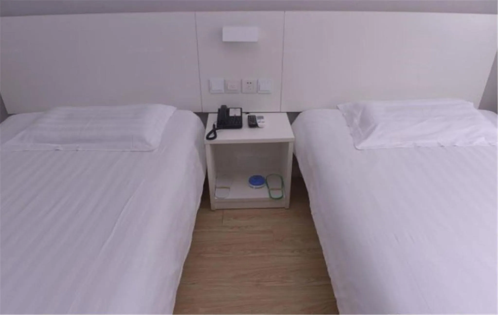 Bed in Motel Ji'nan Shandong University Shanda Road