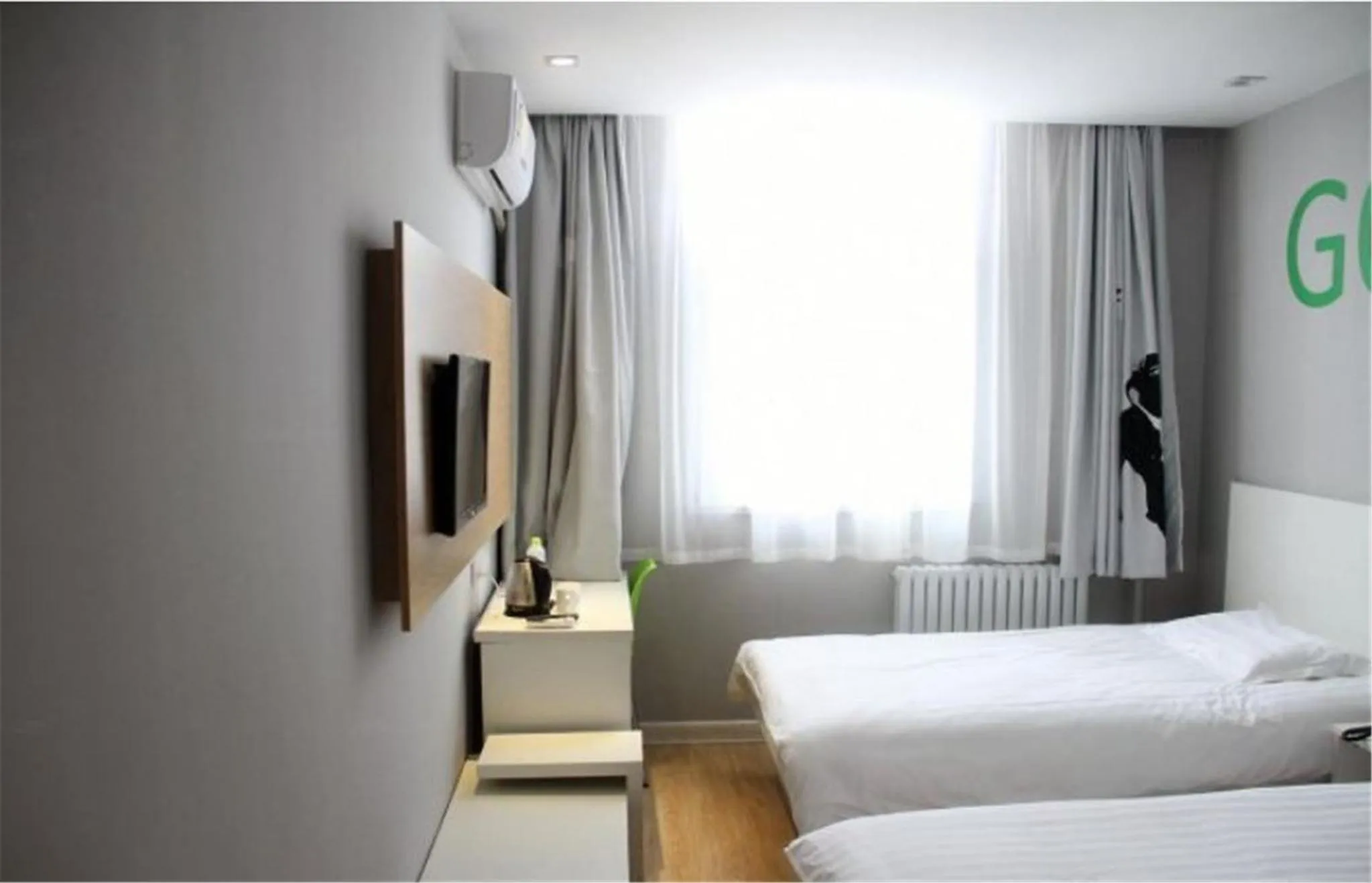 Bed in Motel Ji'nan Shandong University Shanda Road