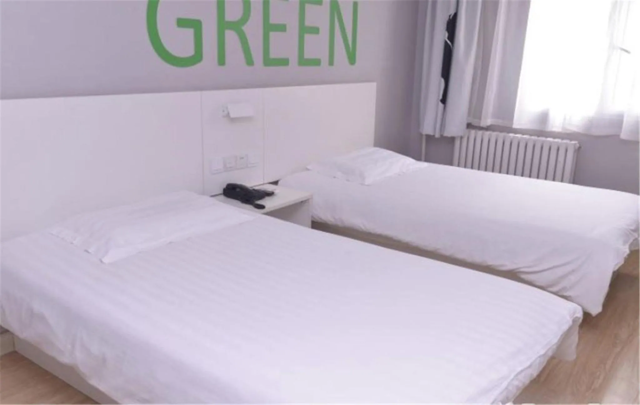 Bed in Motel Ji'nan Shandong University Shanda Road