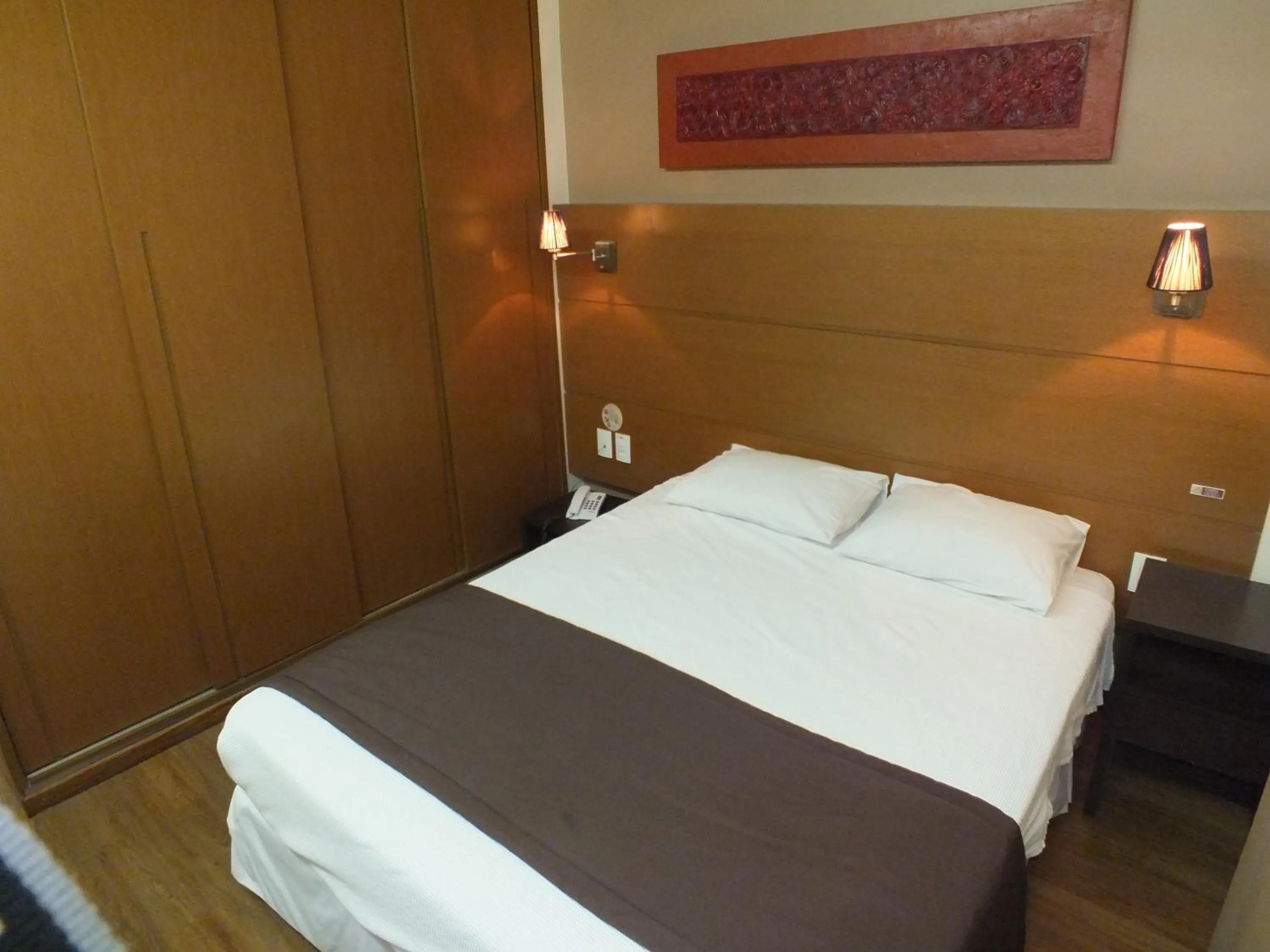 Bed in JB Palace Hotel