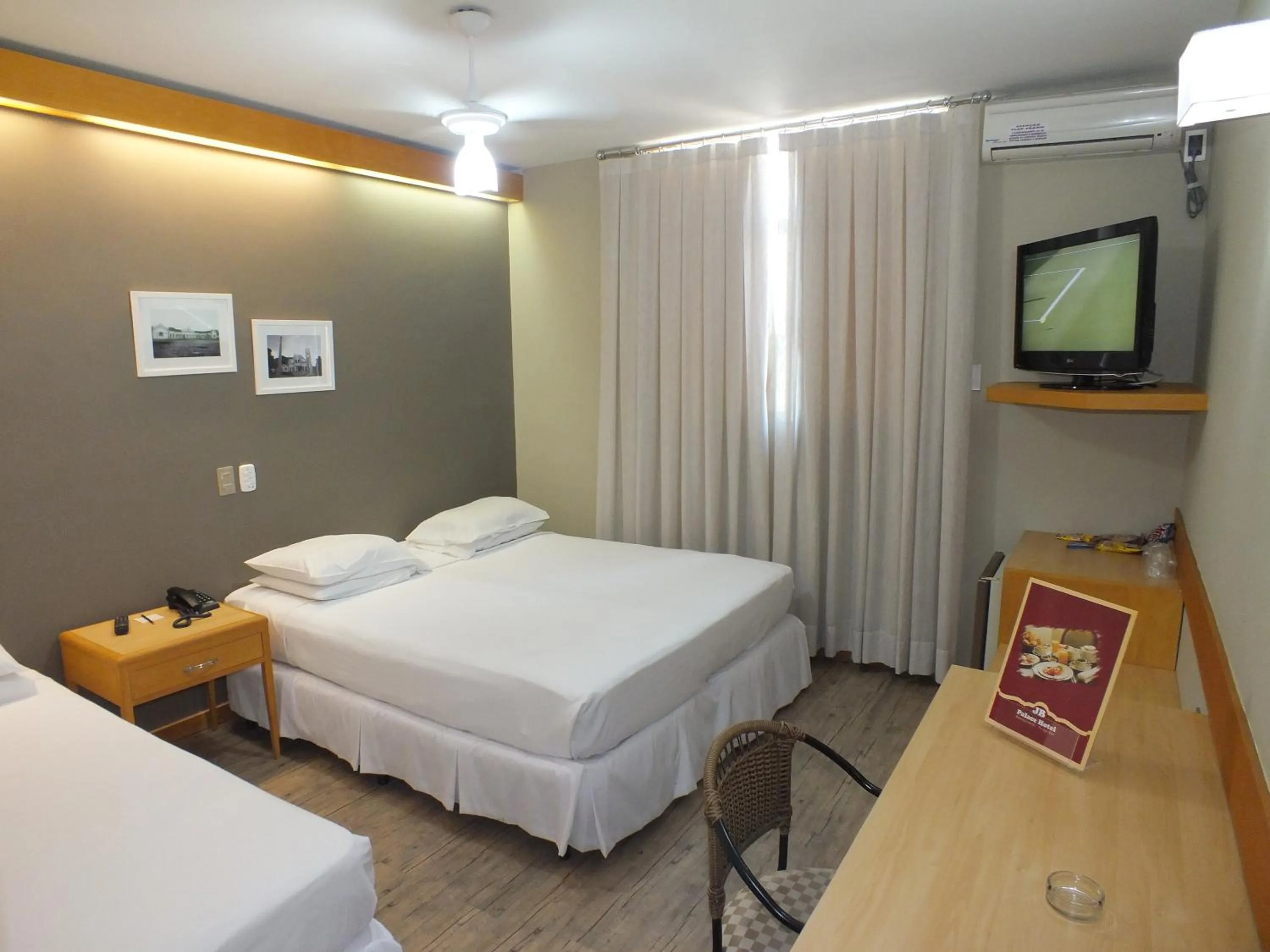 Photo of the whole room, Bed in JB Palace Hotel