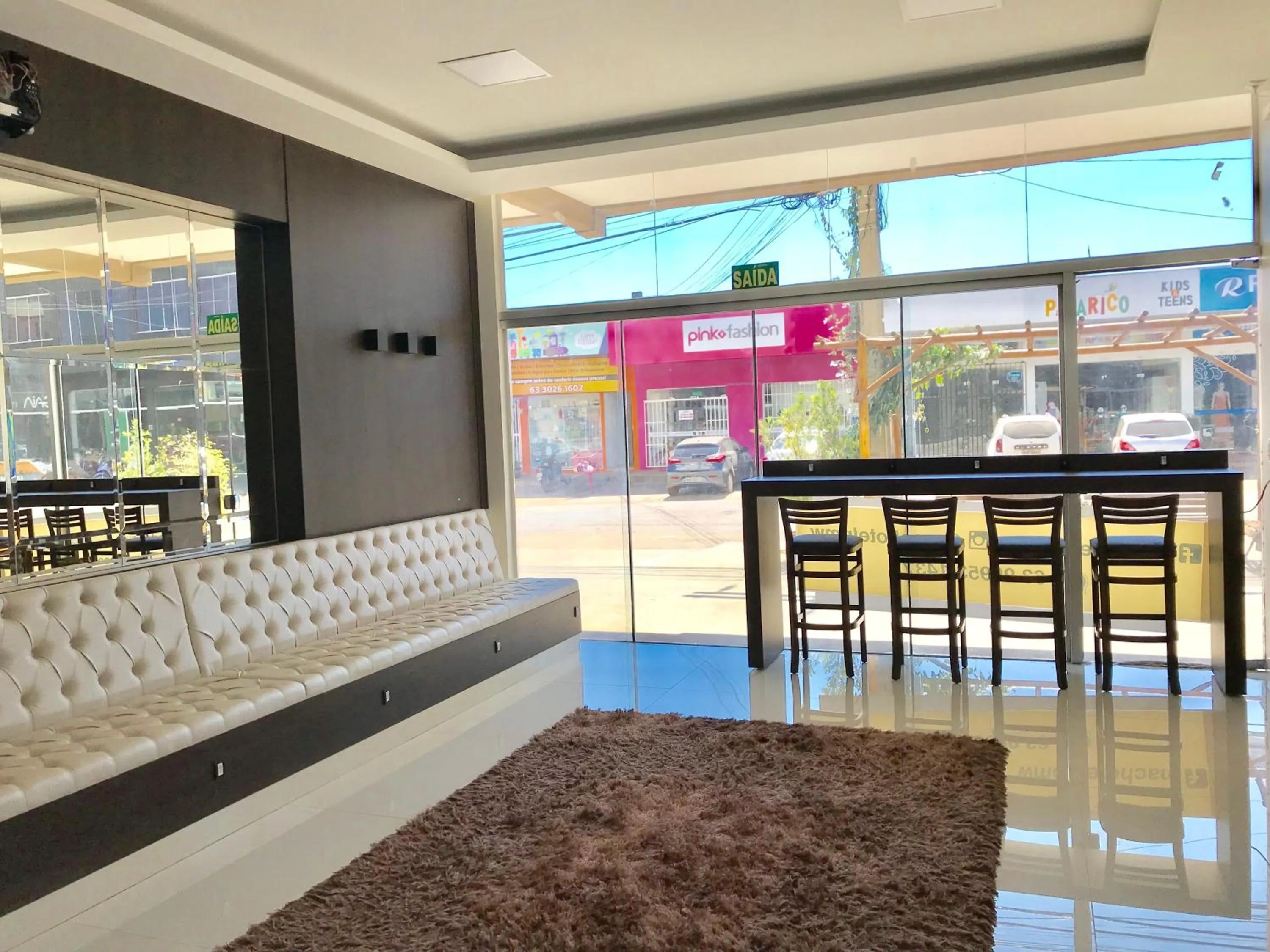 Communal lounge/ TV room in Mac Hotel