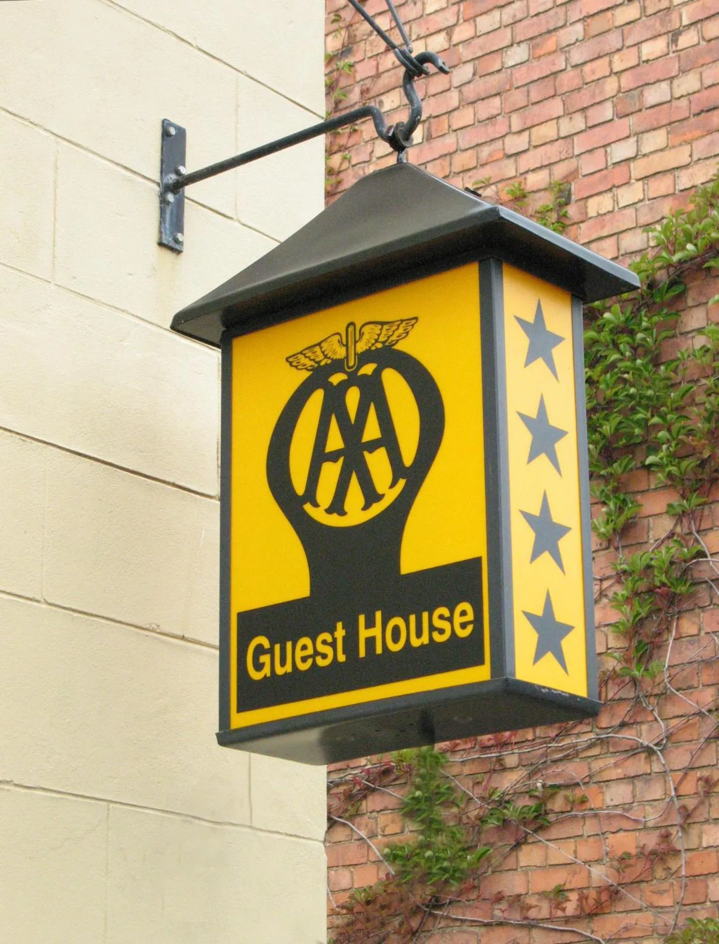 Property logo or sign in The Coach House