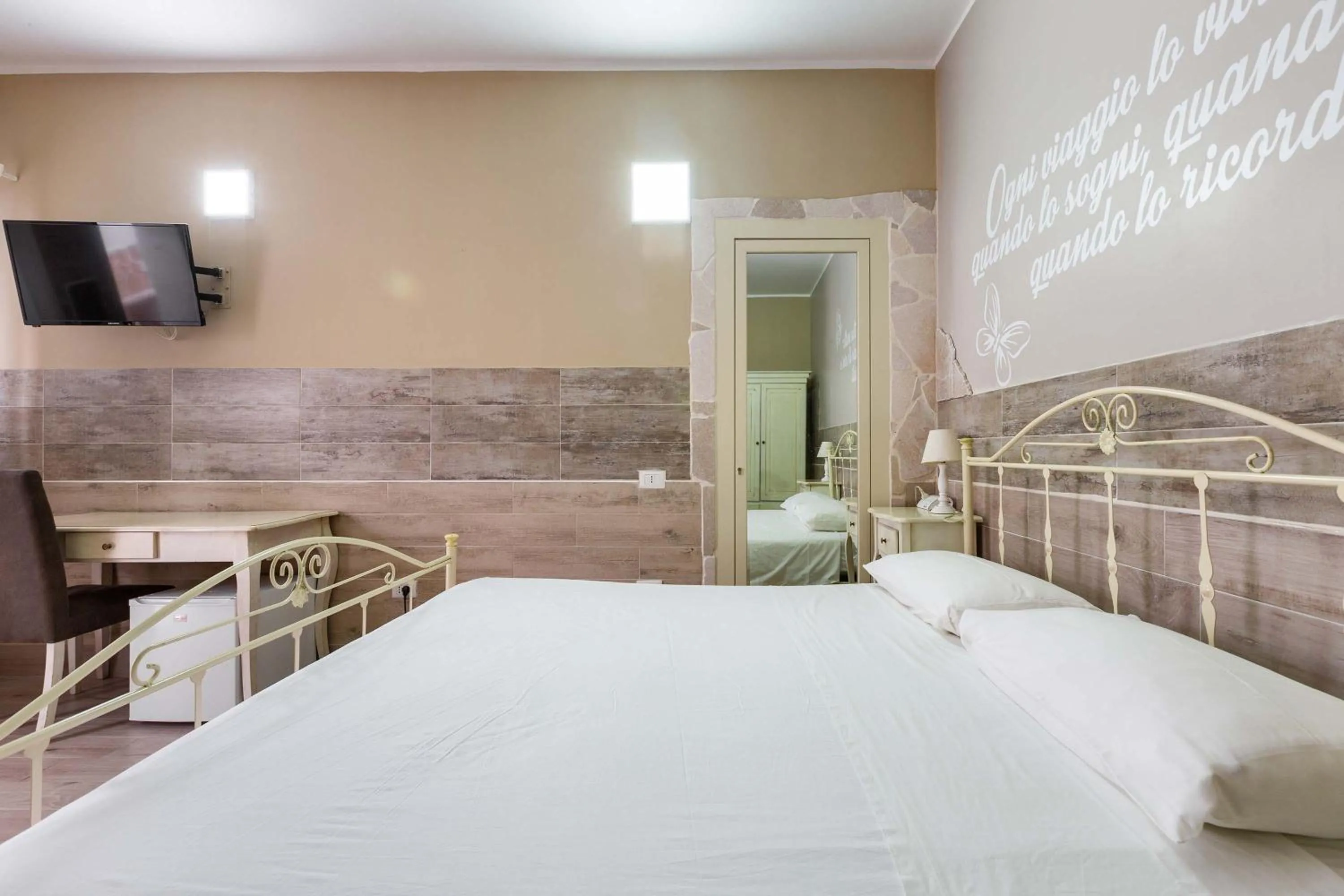 Bed in Re Sole Resort&Spa