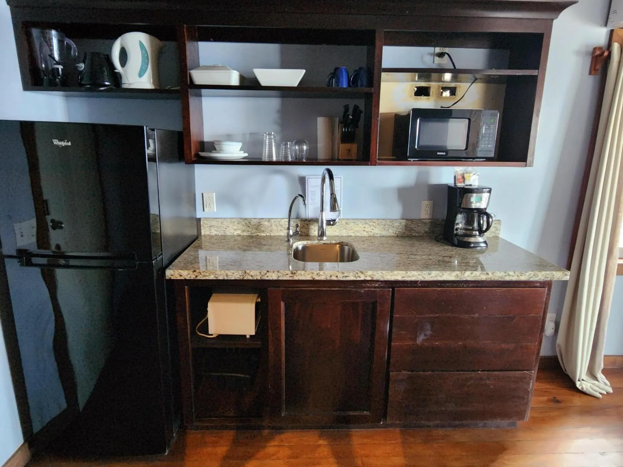 Kitchen or kitchenette in Maya Beach Hotel