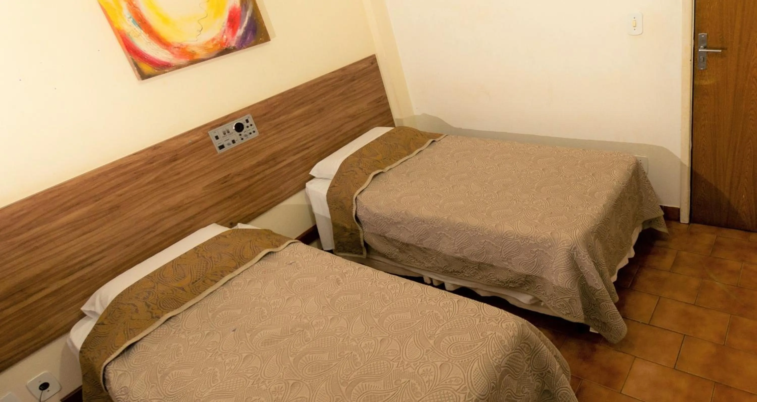 Bed in Hotel Pouso Novo