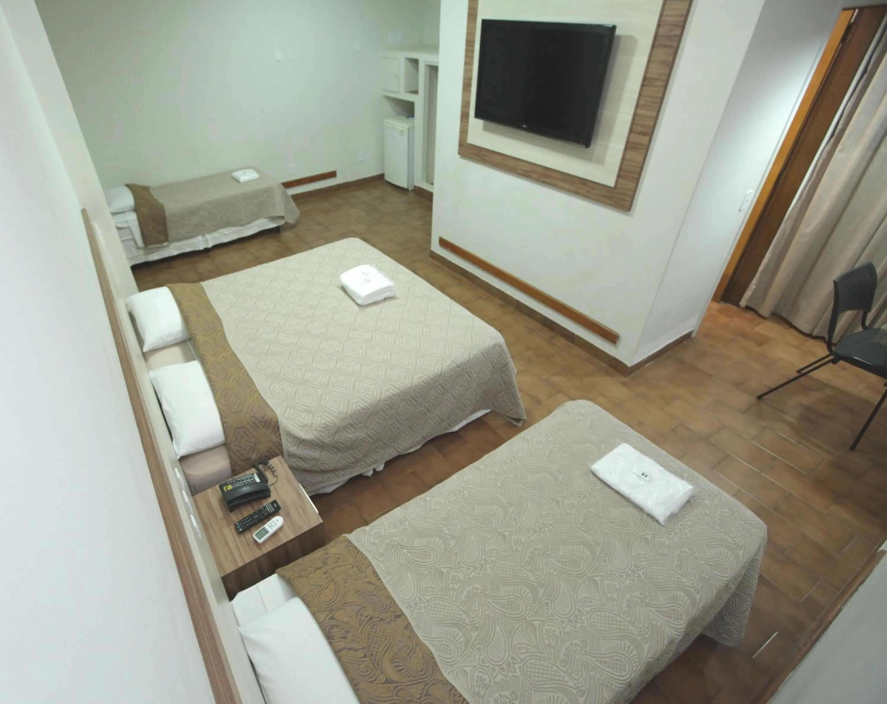 Bed in Hotel Pouso Novo