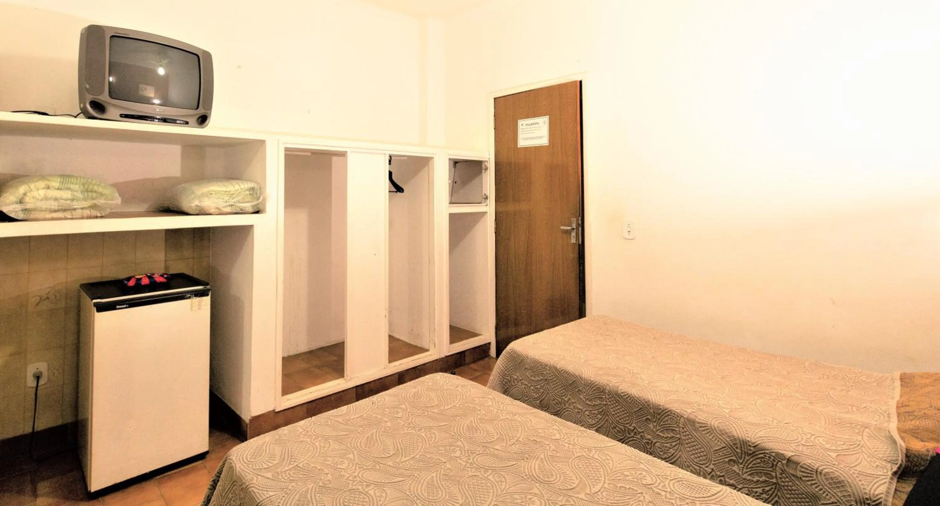 Bed in Hotel Pouso Novo