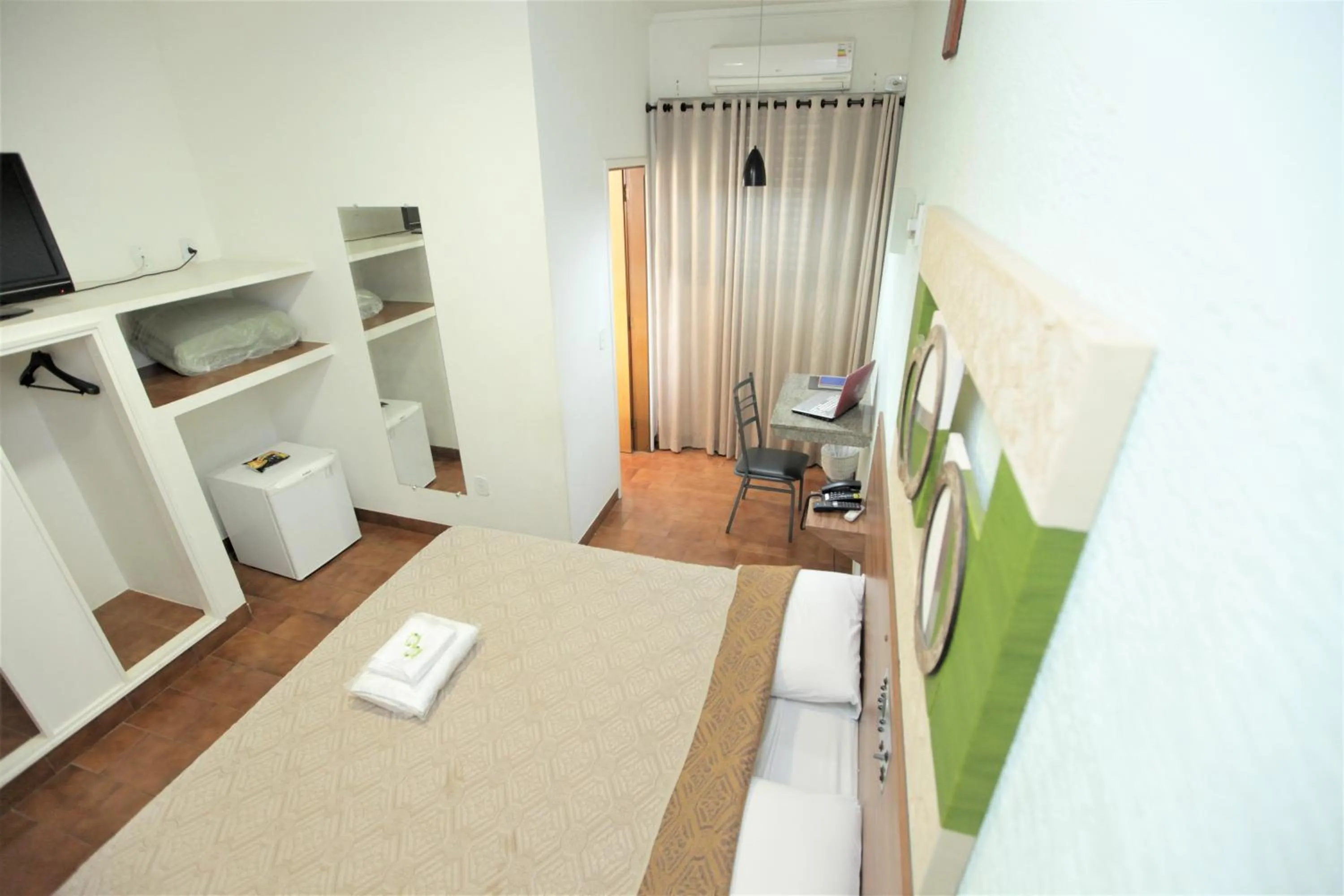 Bed in Hotel Pouso Novo