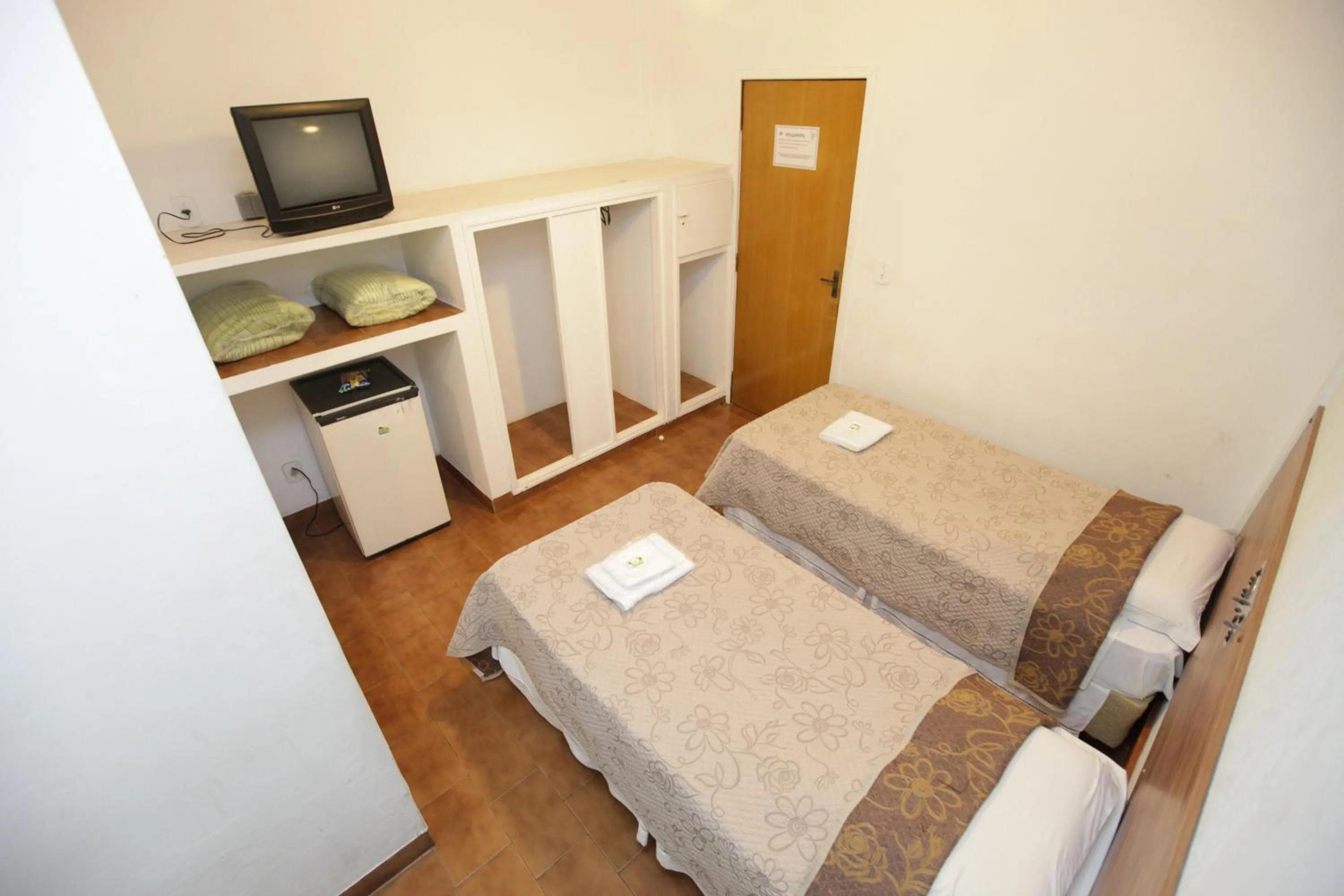 Bed in Hotel Pouso Novo