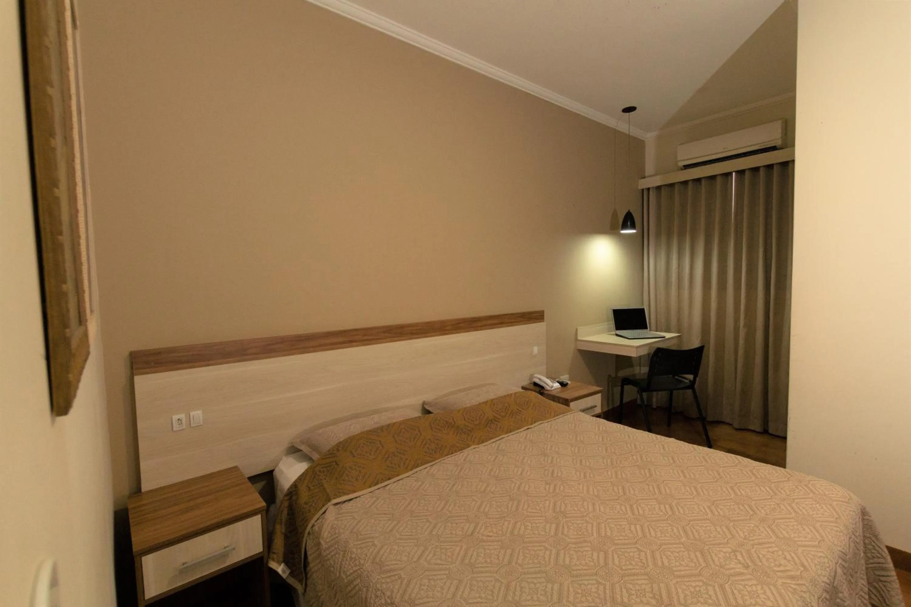 Bed in Hotel Pouso Novo