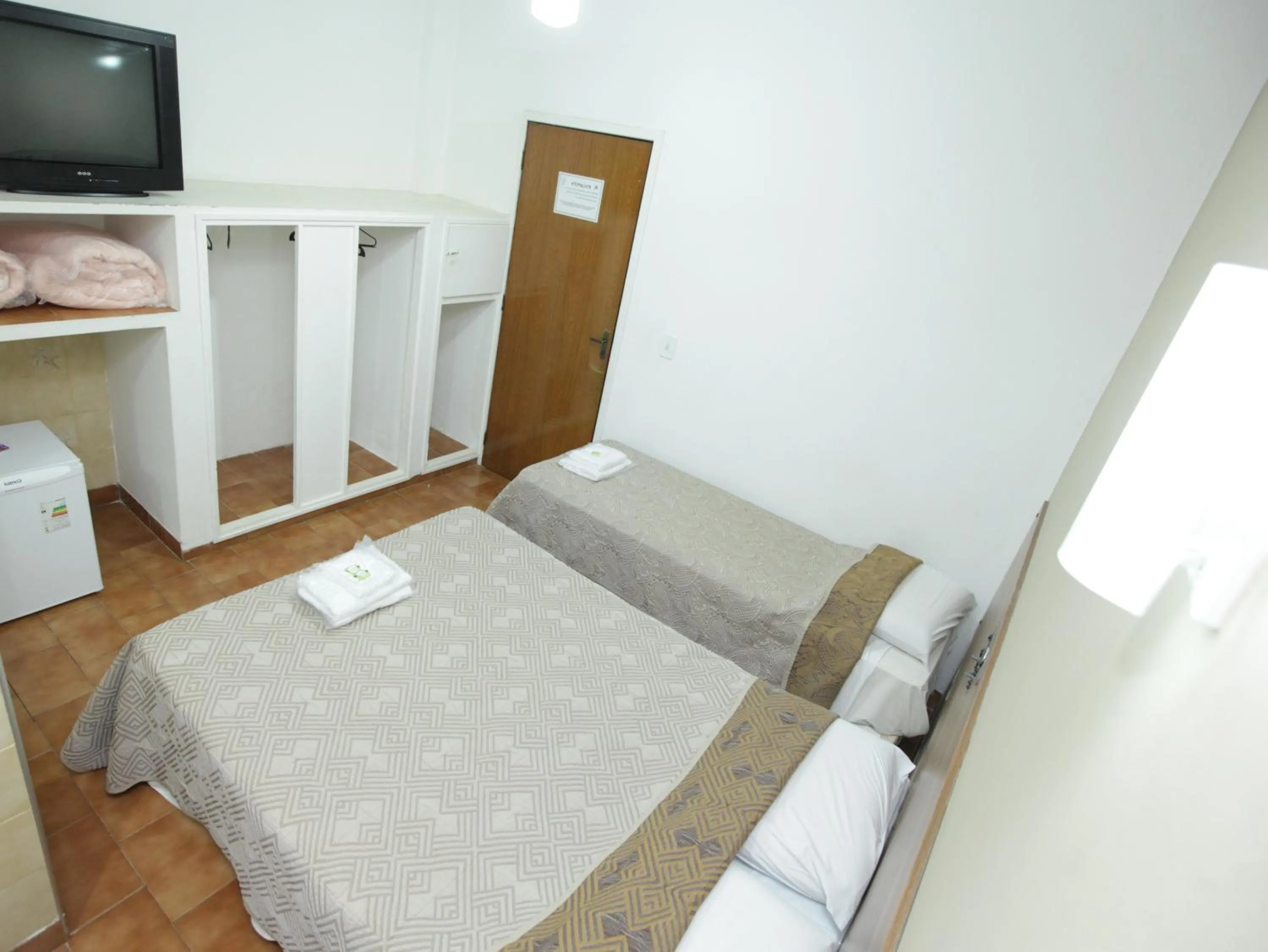 Bed in Hotel Pouso Novo