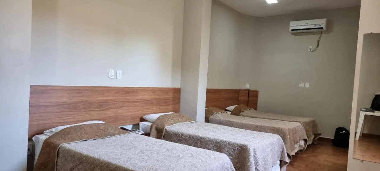 Bed in Hotel Pouso Novo