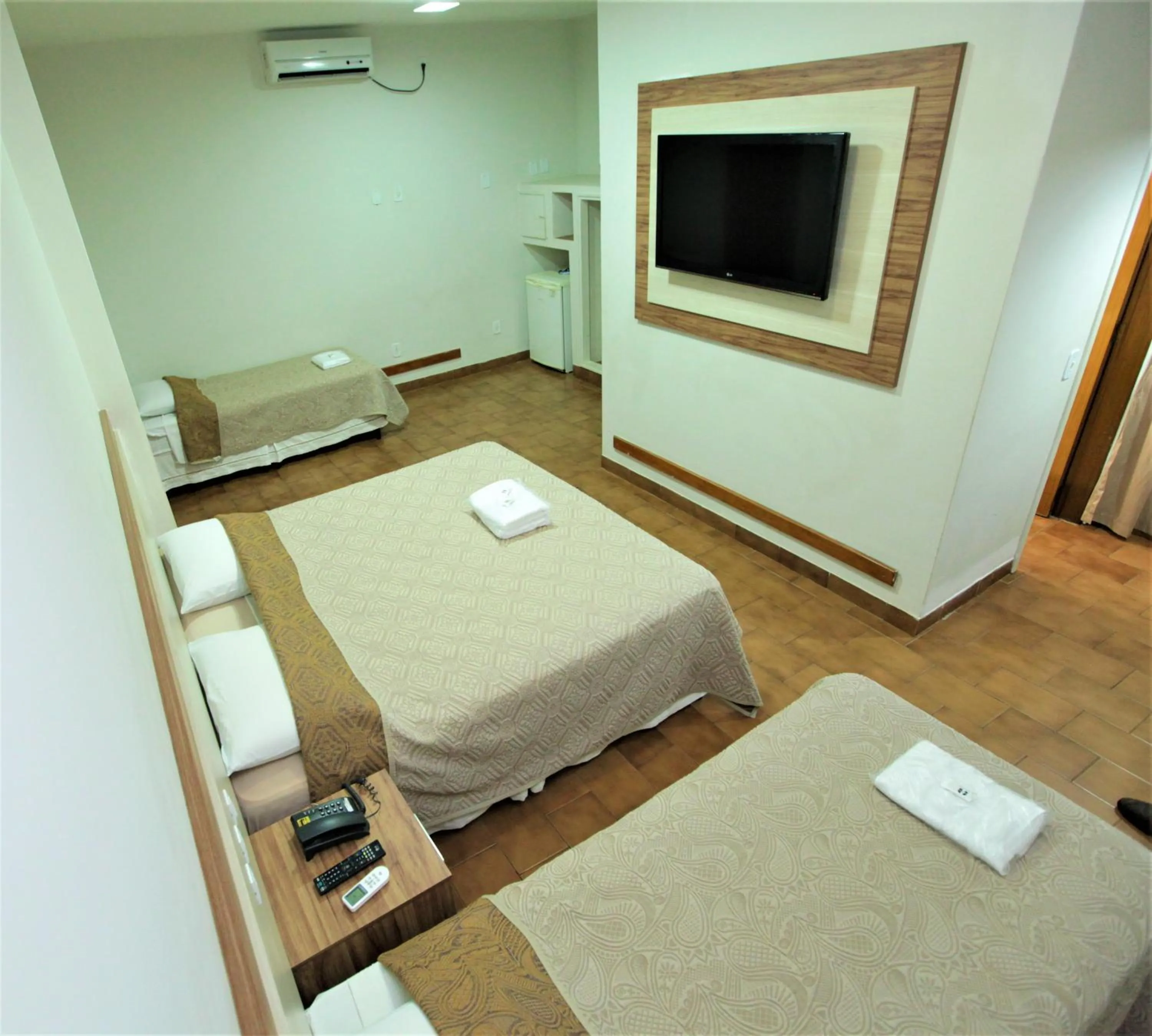 Bed in Hotel Pouso Novo