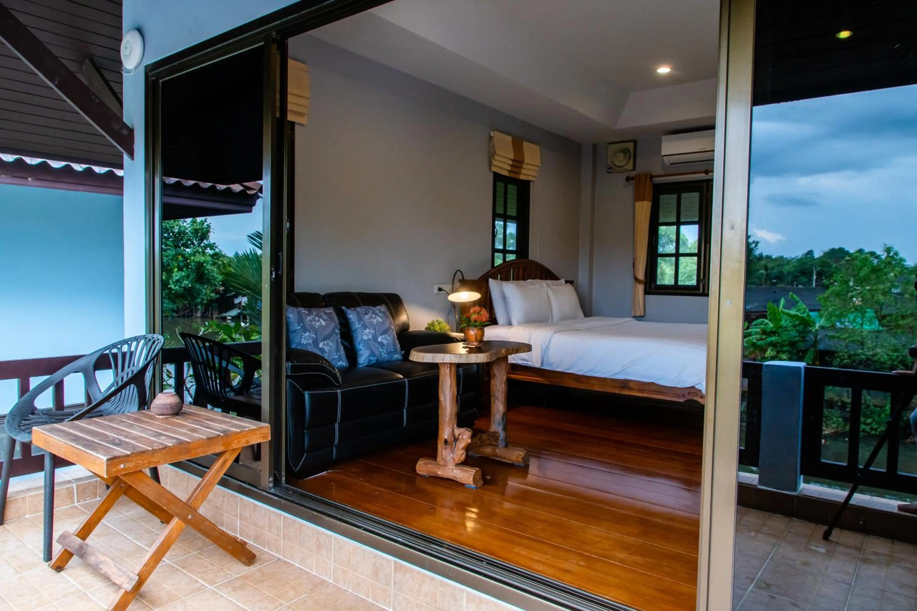 Bed in BaanRimNam Resort Trat