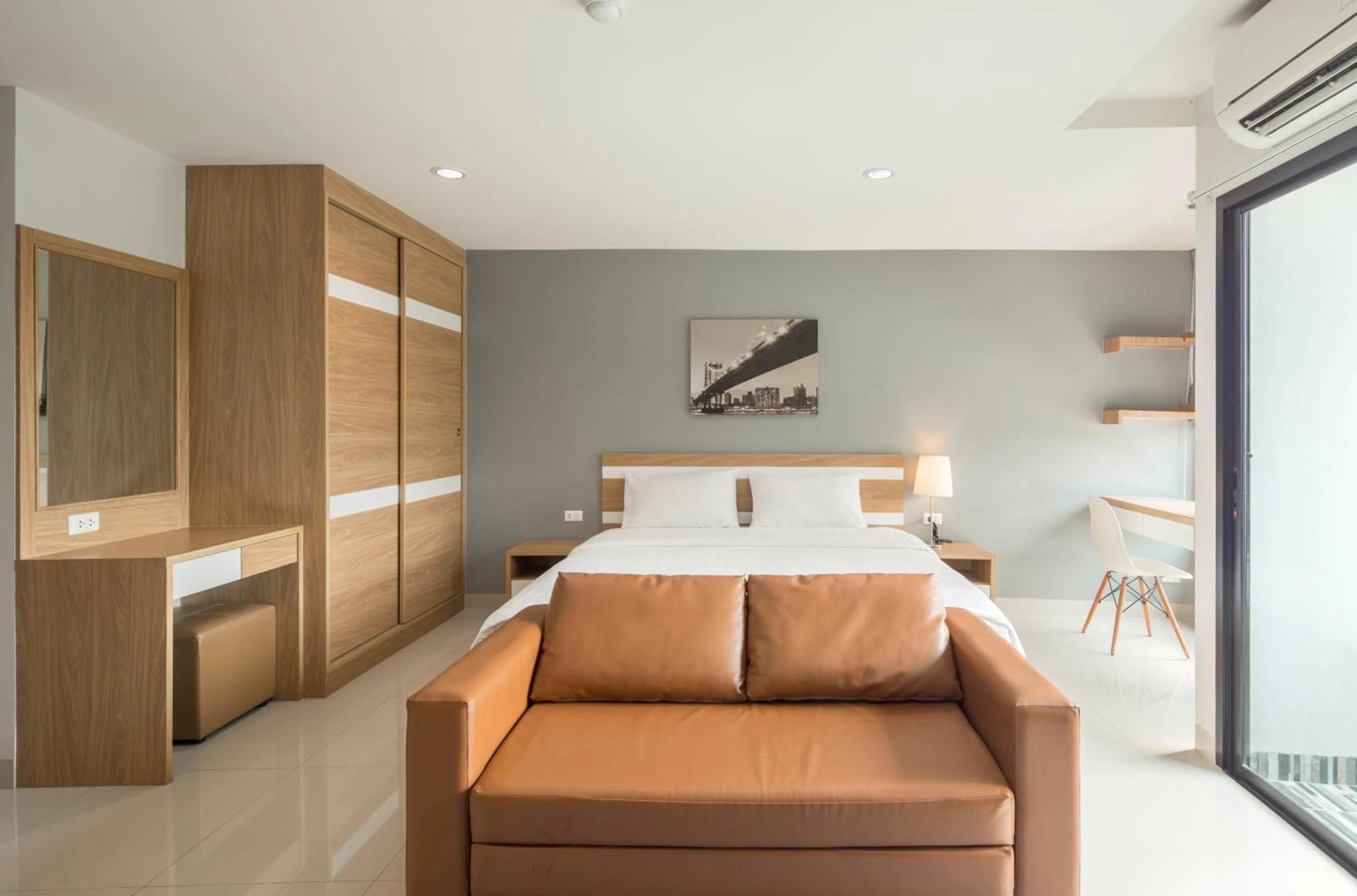 Bed in JK LIVING Hotel And Service Apartment