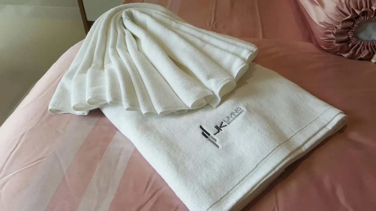 Bed in JK LIVING Hotel And Service Apartment