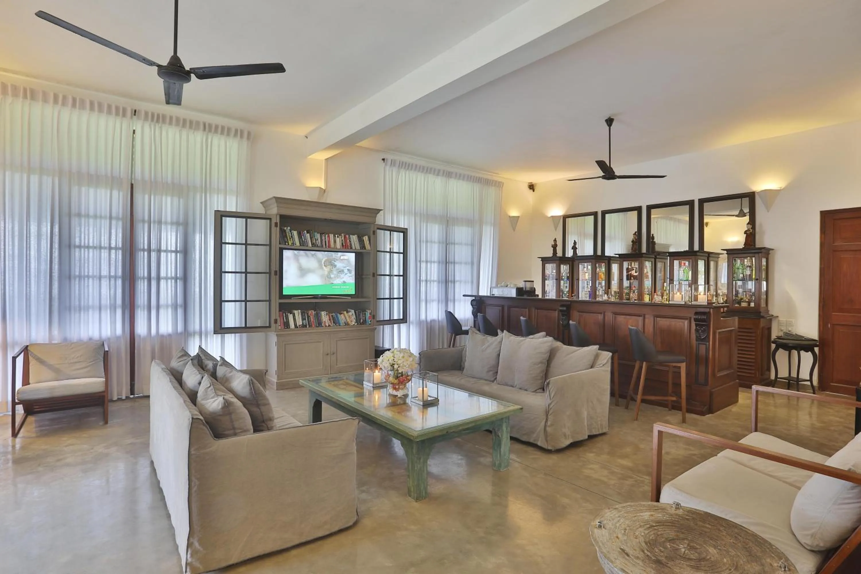 Lounge or bar in The Frangipani Tree by Edwards Collection - Thalpe