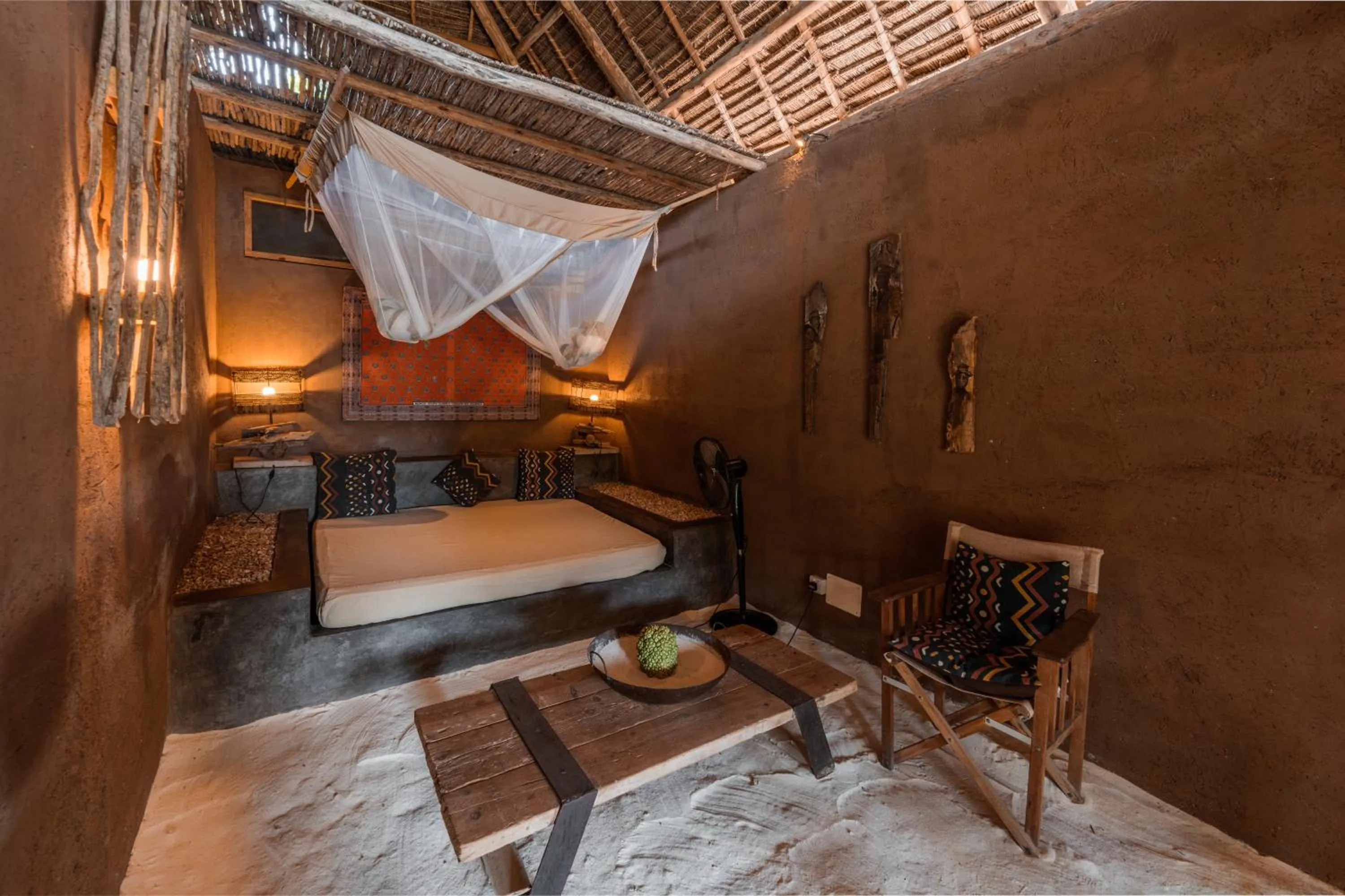 Seating area, Bed in Mwezi Boutique Resort