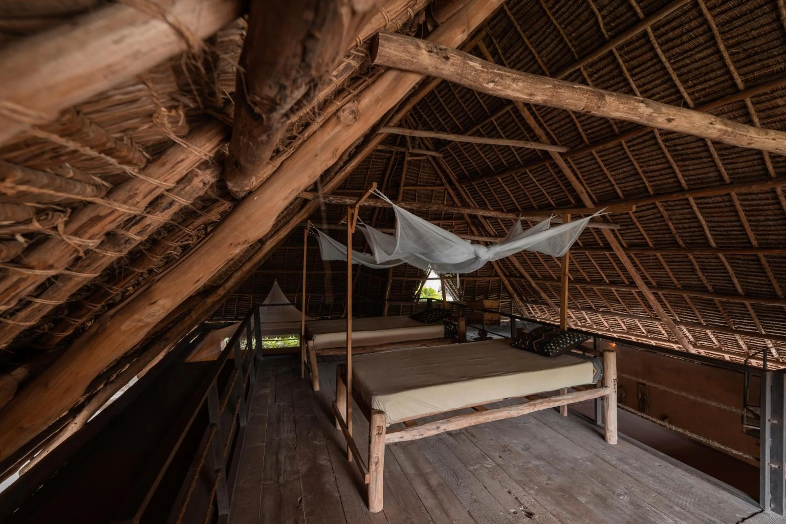 Bed in Mwezi Boutique Resort