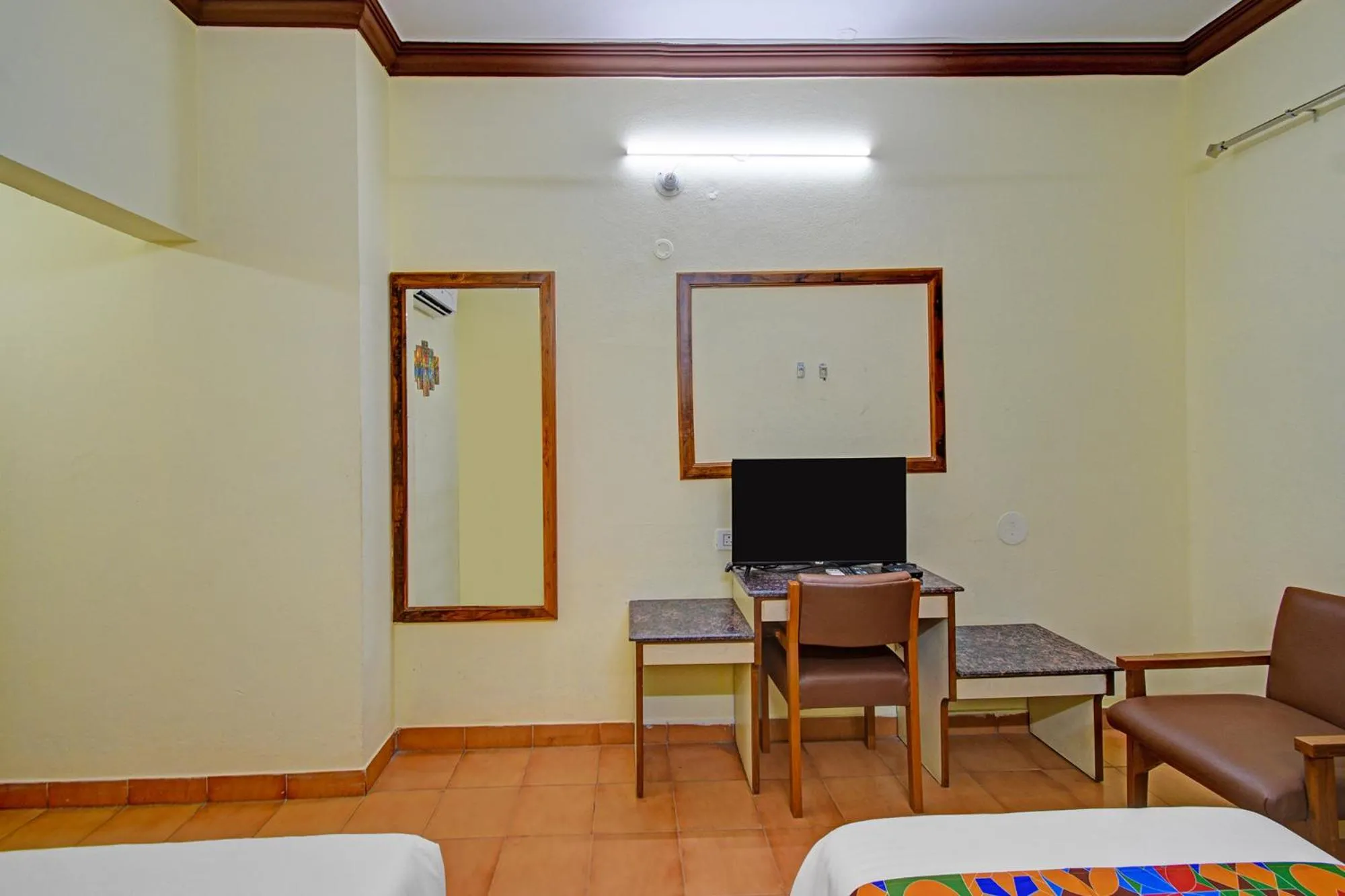 Bed in FabHotel Ranjit Residency