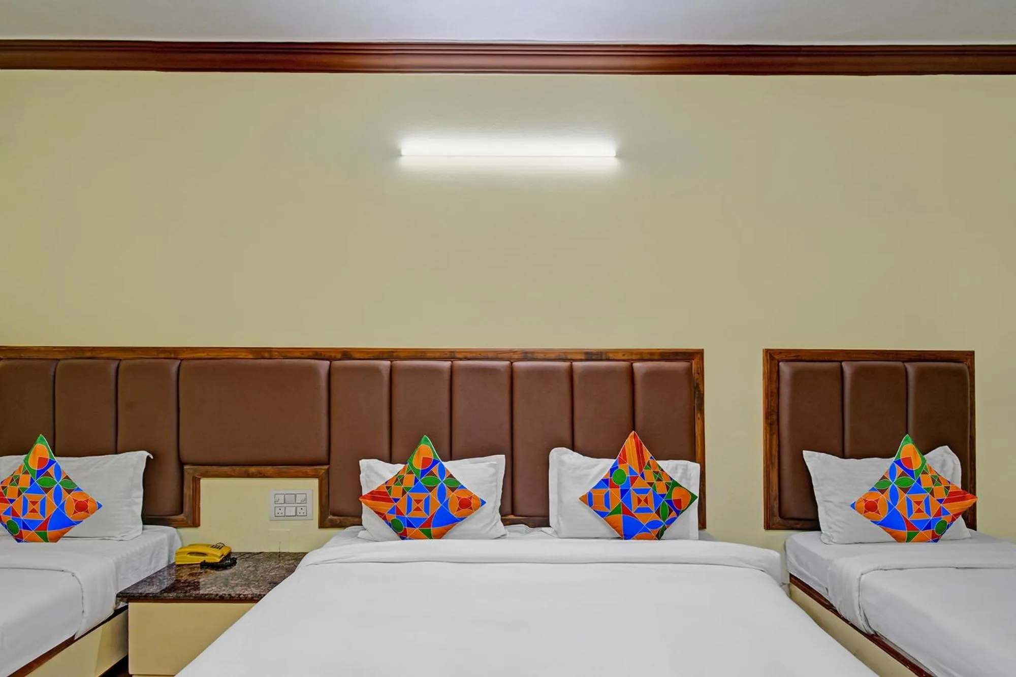Bed in FabHotel Ranjit Residency