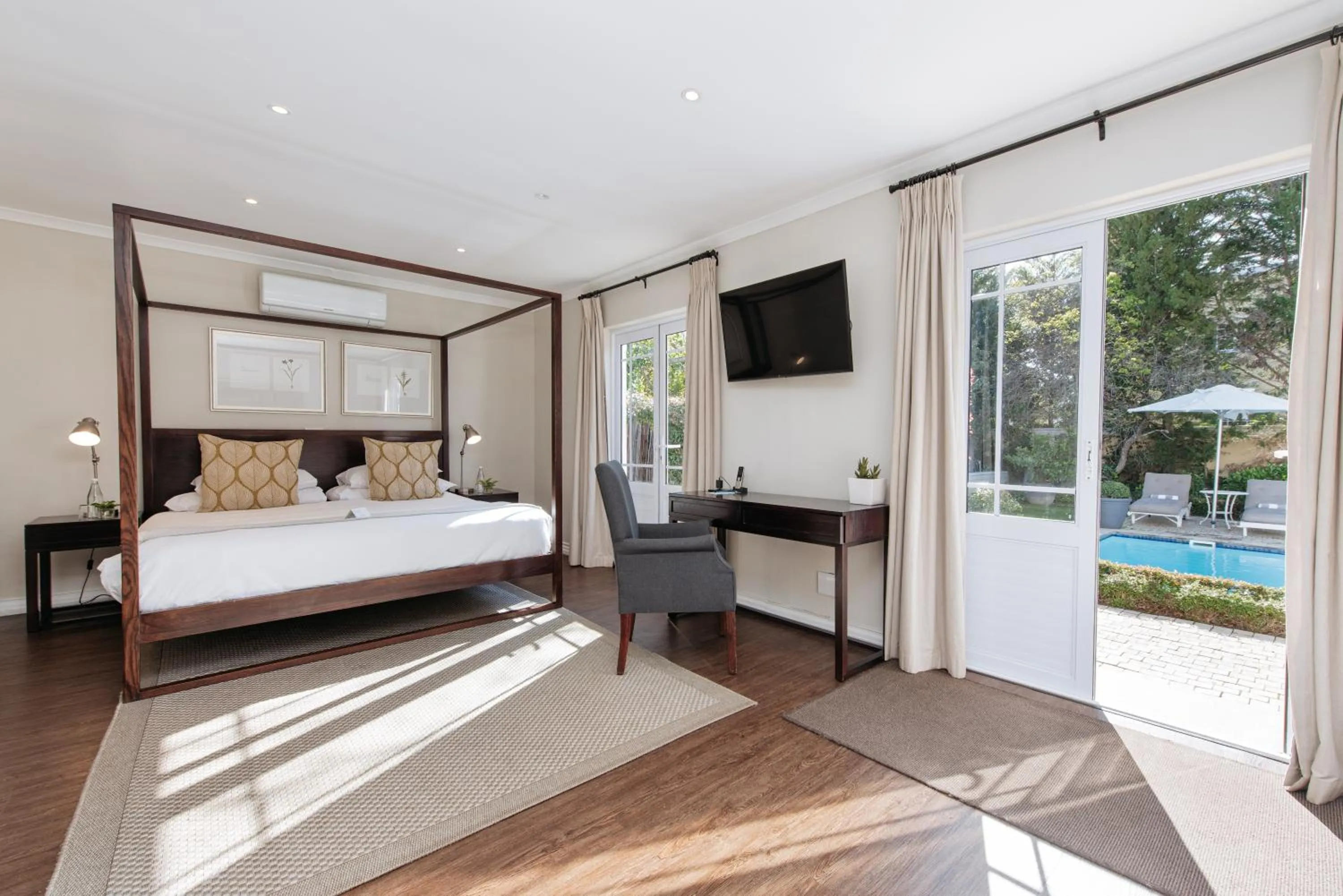 Communal lounge/ TV room, Bed in River Manor Boutique Hotel by The Living Journey Collection