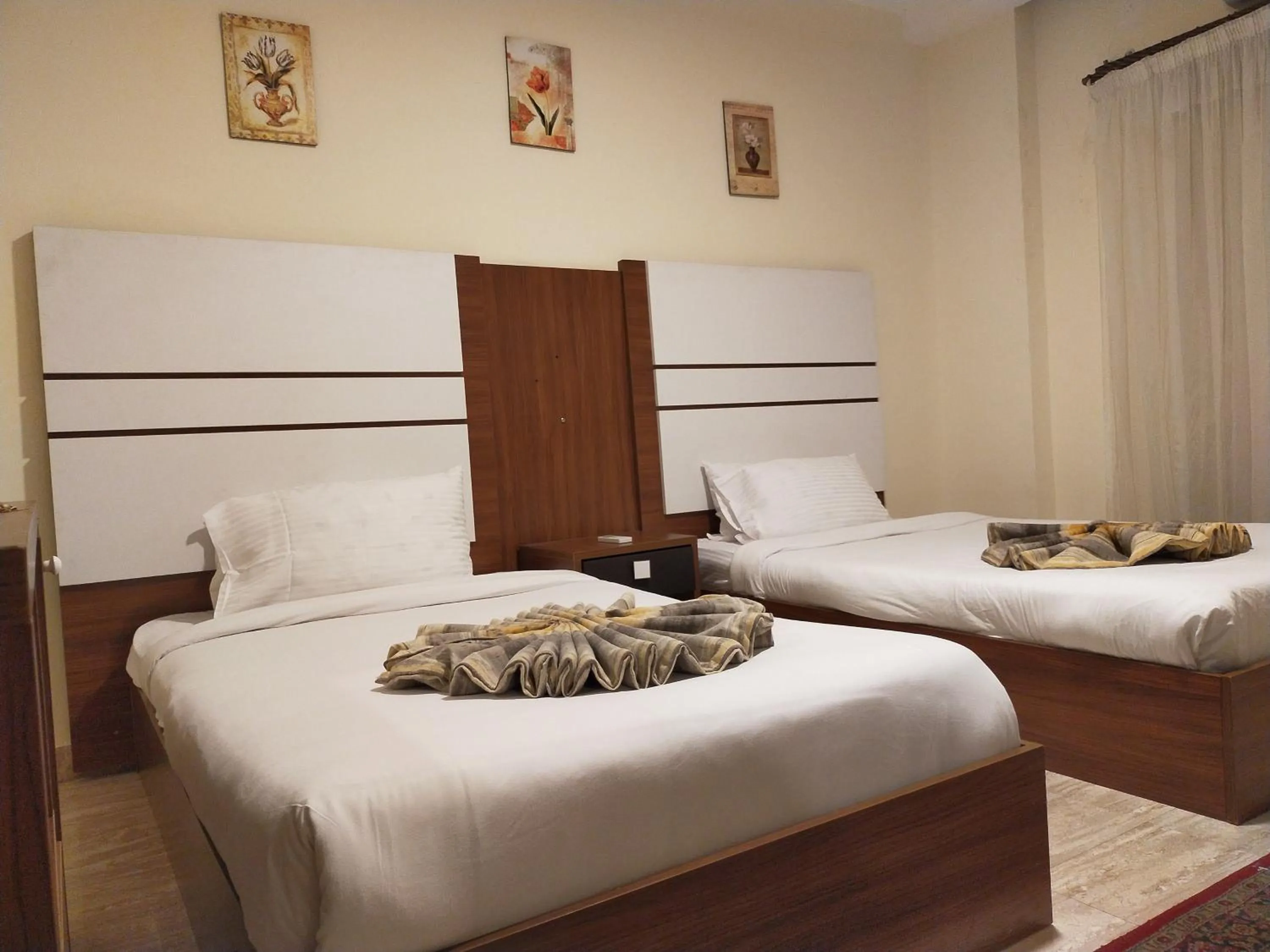 Bed in 26th of July Apartments