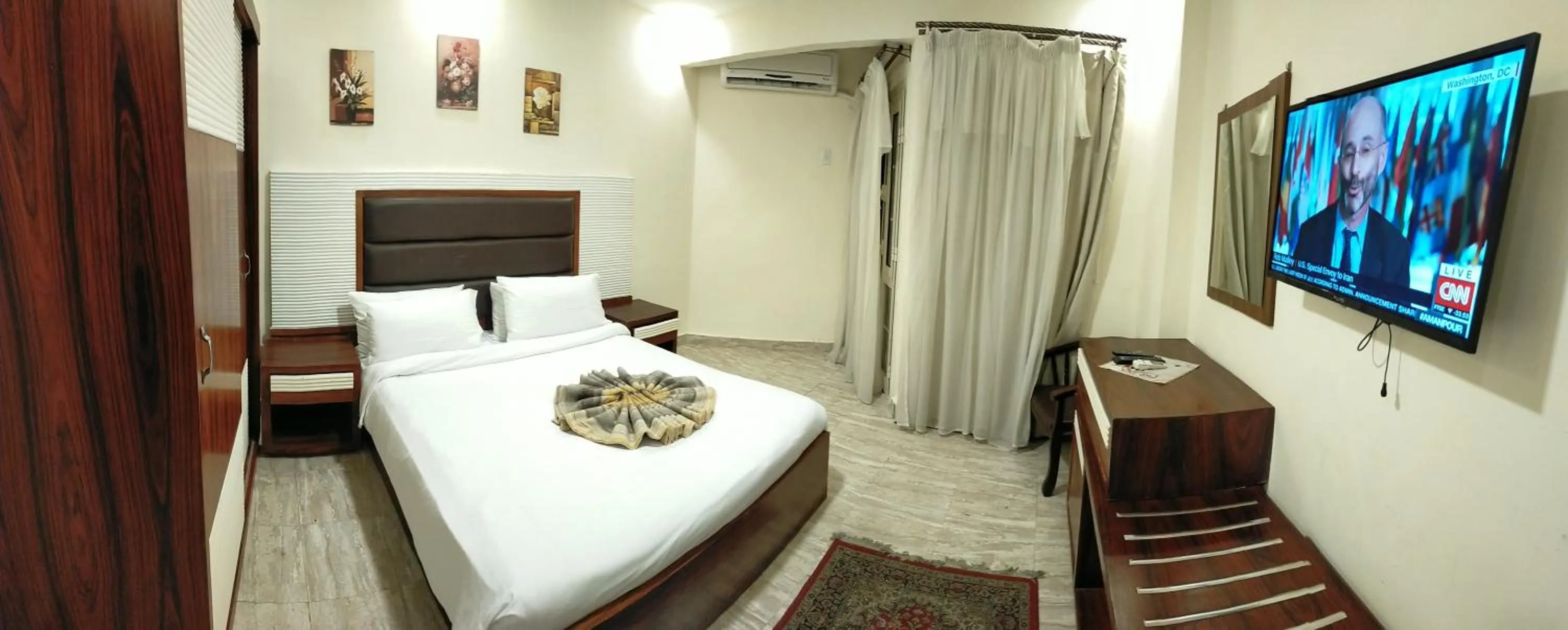 Bed in 26th of July Apartments