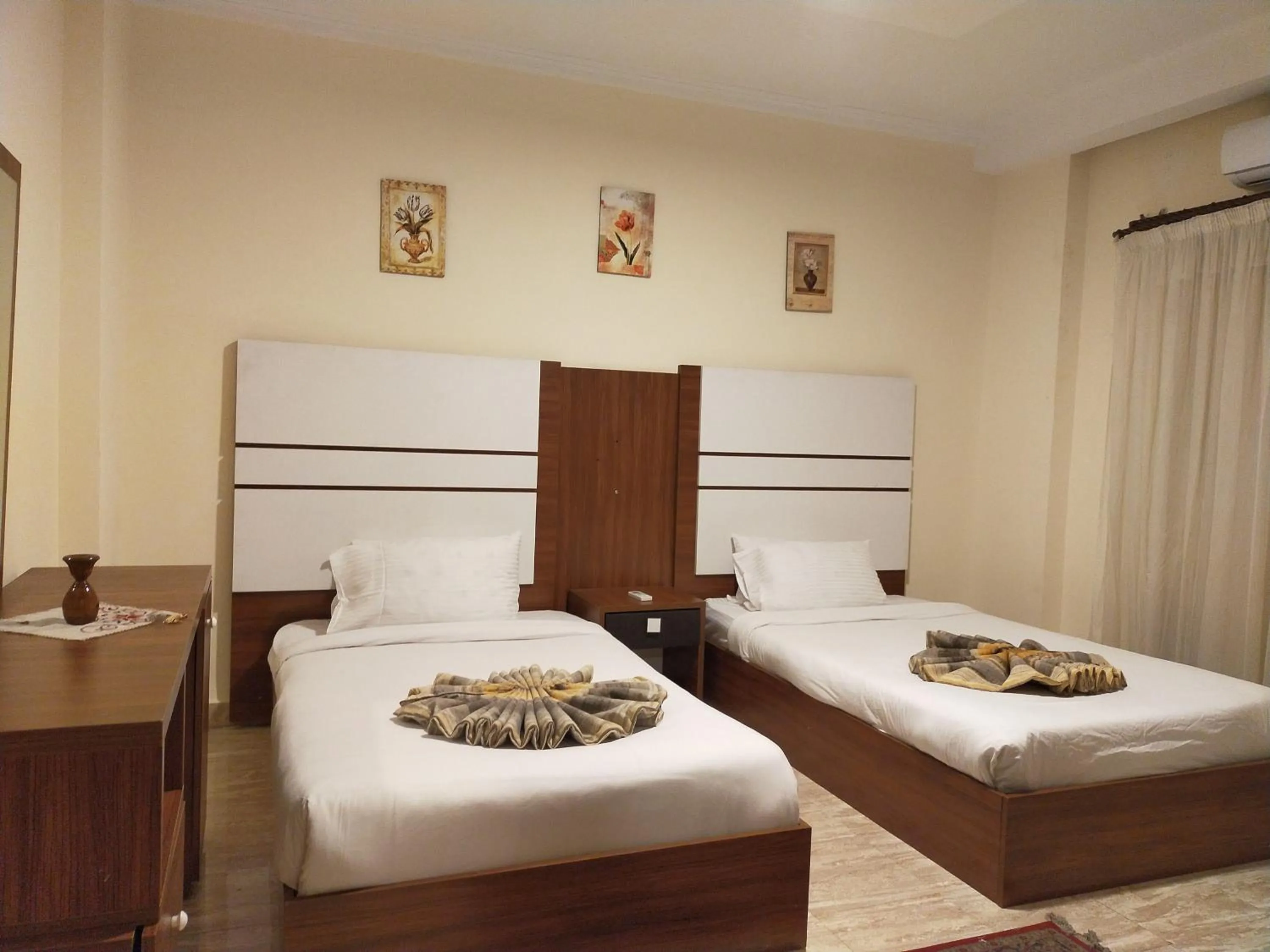 Bed in 26th of July Apartments