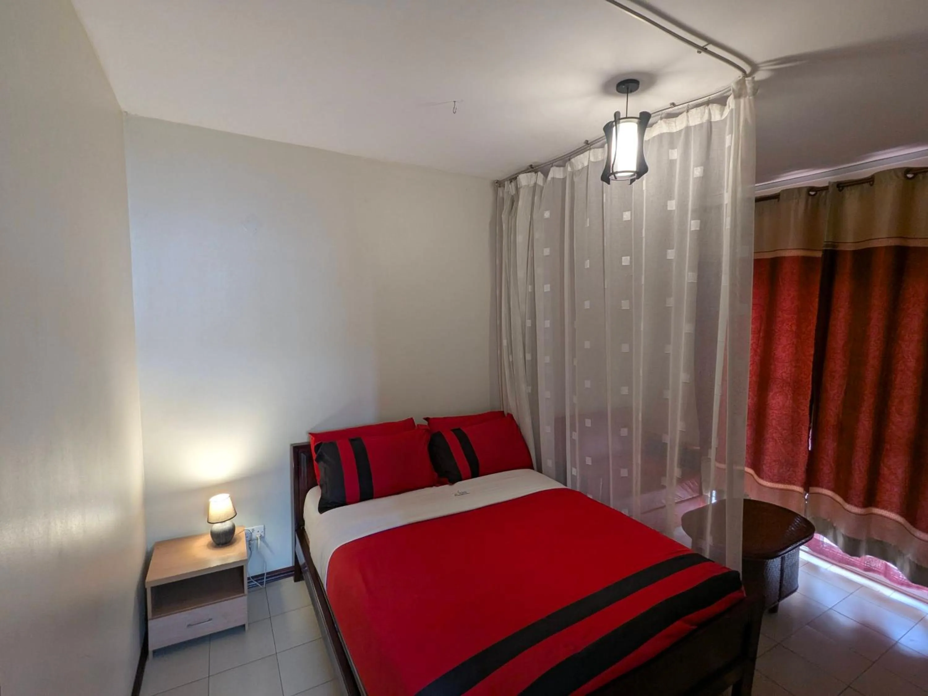 Bed in Hotel Royal Nest Entebbe