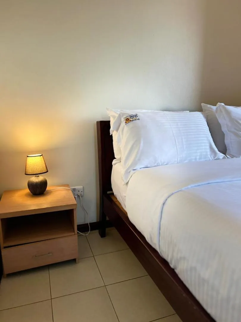 Bed in Hotel Royal Nest Entebbe