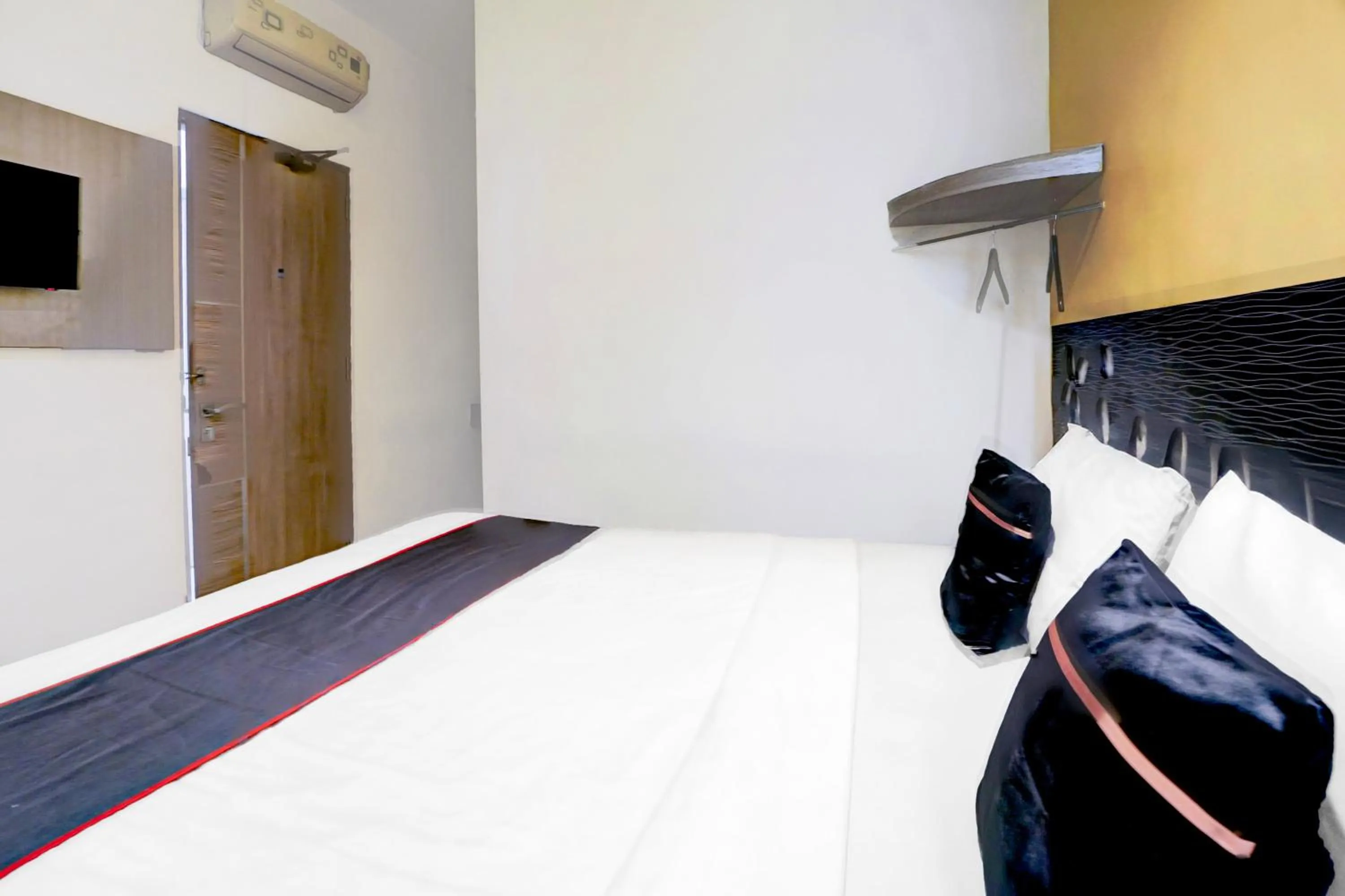 Bed in Hotel O Symphony Homestay Tlogomas